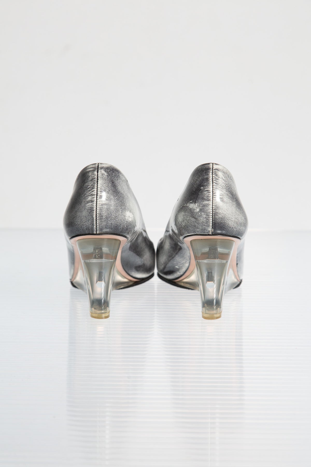 PRADA SILVER LEATHER WEDGE PUMPS