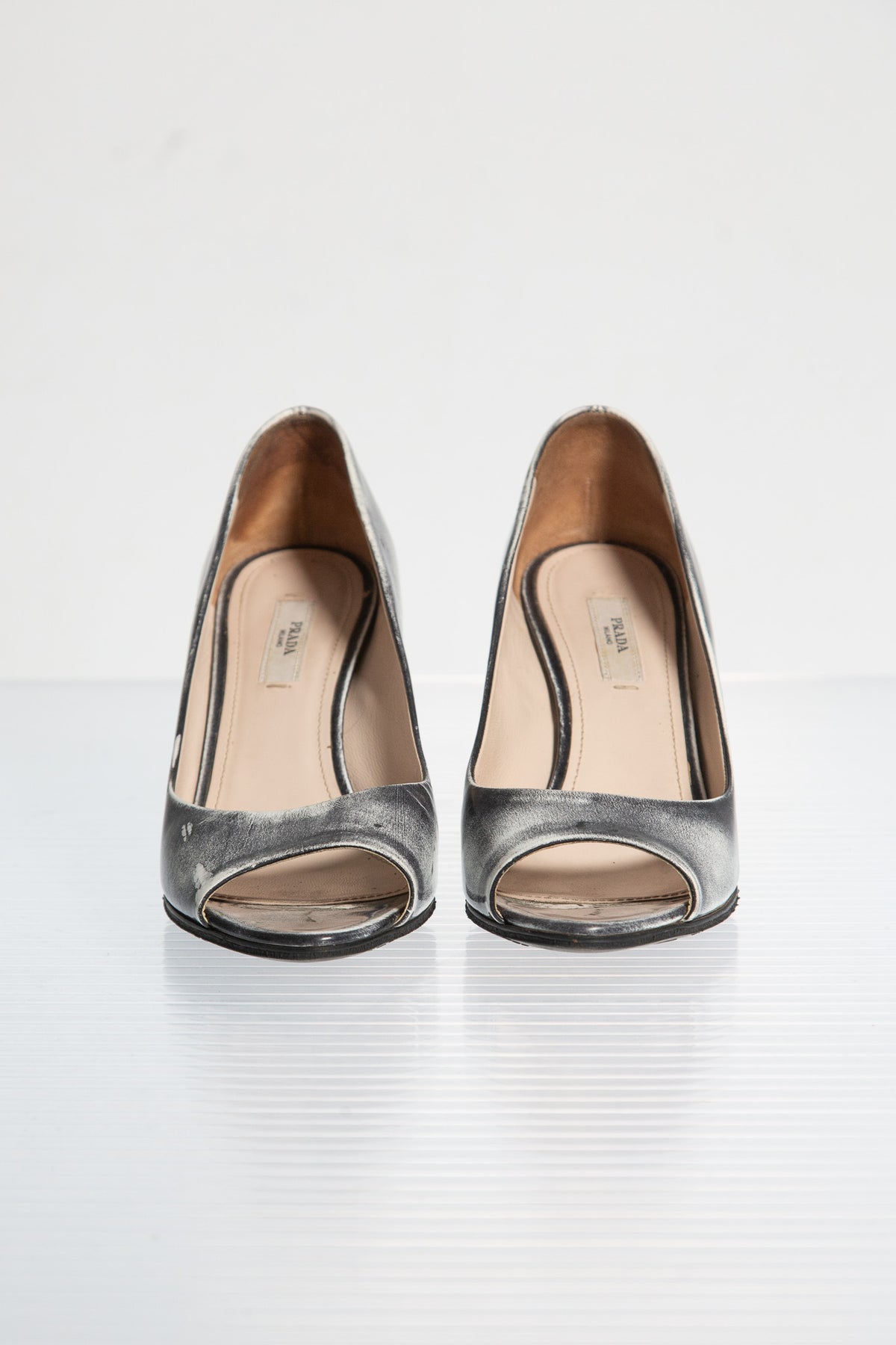 PRADA SILVER LEATHER WEDGE PUMPS