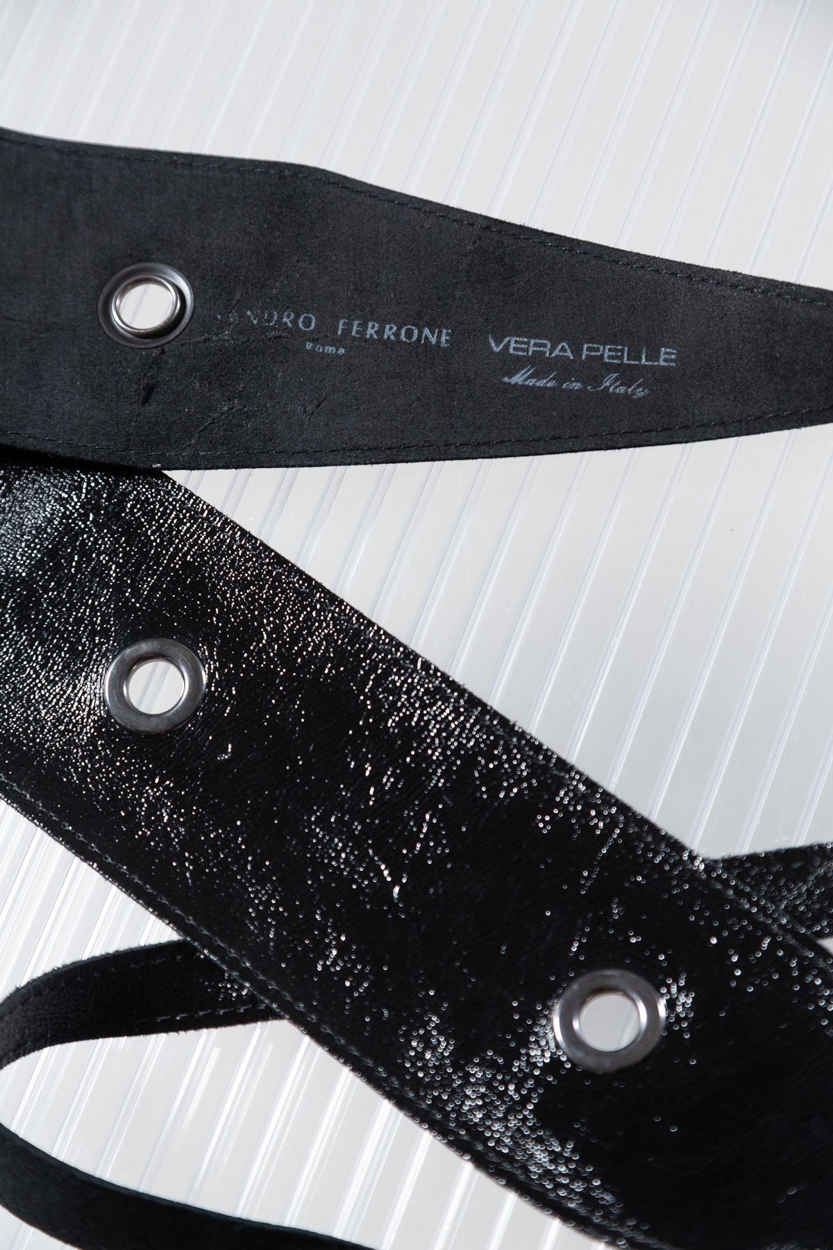 BLACK PATENT LEATHER EYELET BELT