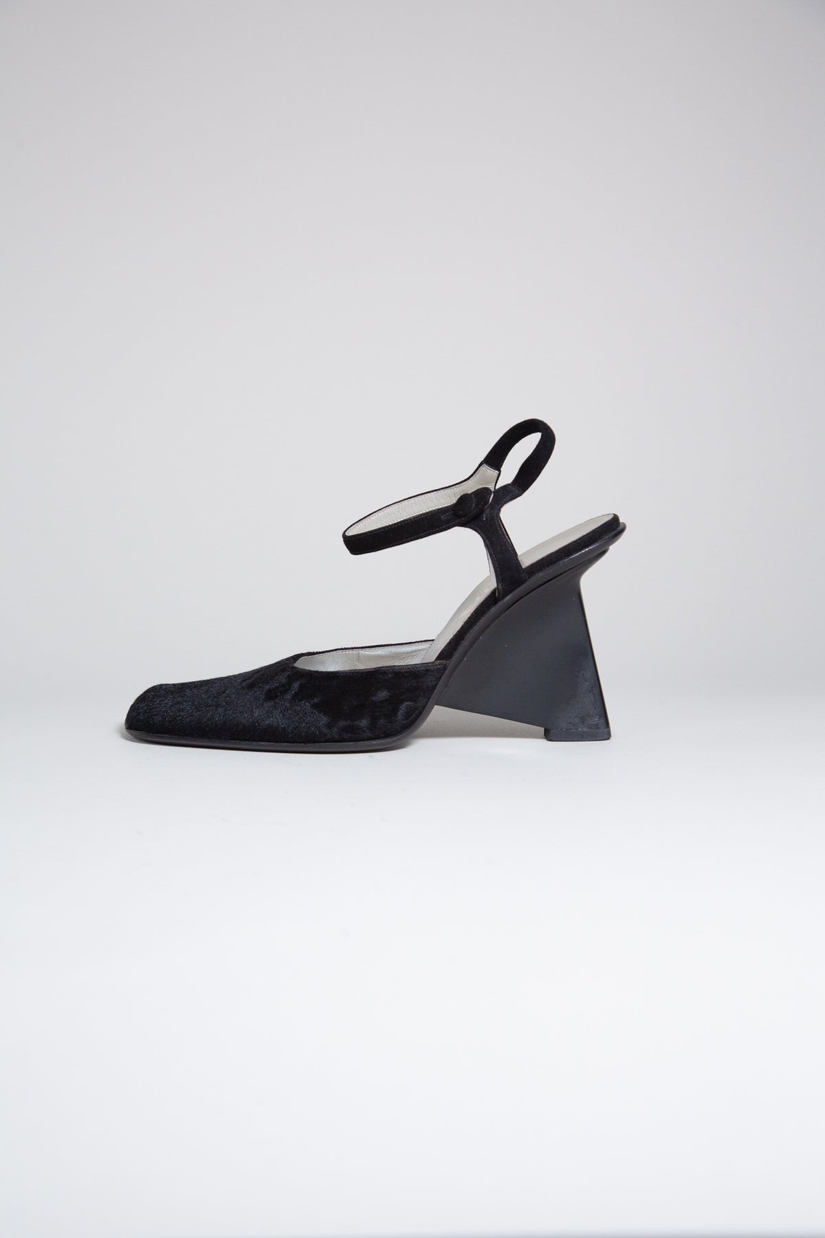 PRADA BLACK PONY HAIR SCULPTURAL HEELS