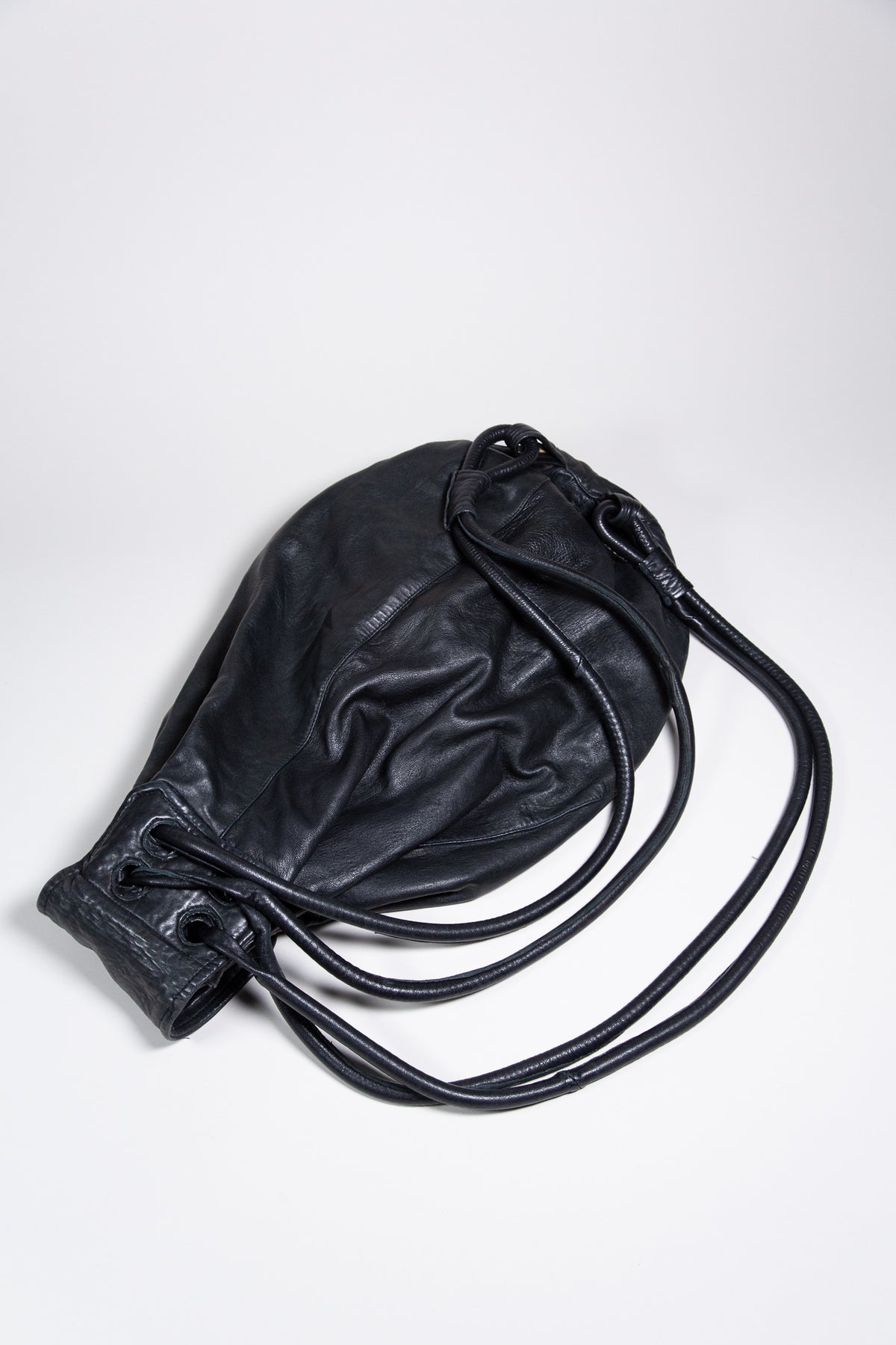 BLACK LEATHER MULTI-STRAP BACKPACK BAG