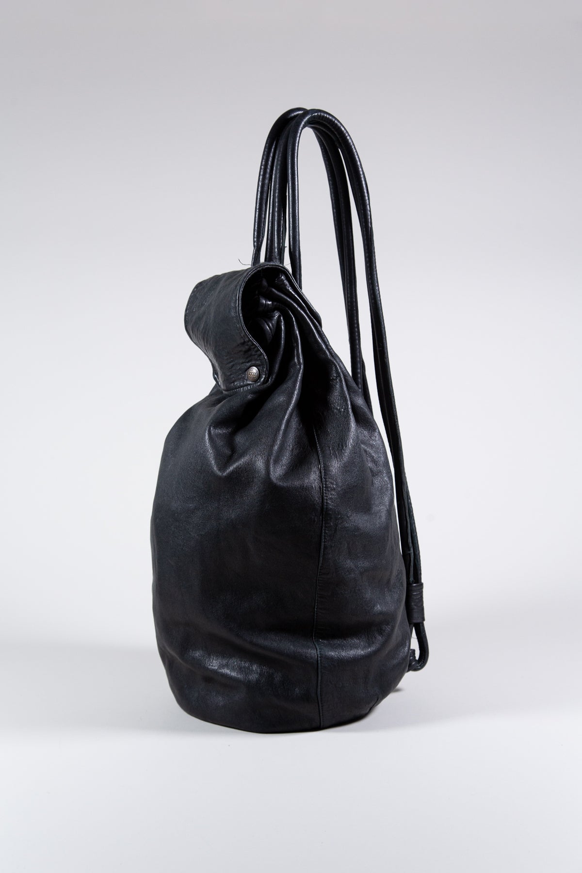 BLACK LEATHER MULTI-STRAP BACKPACK BAG