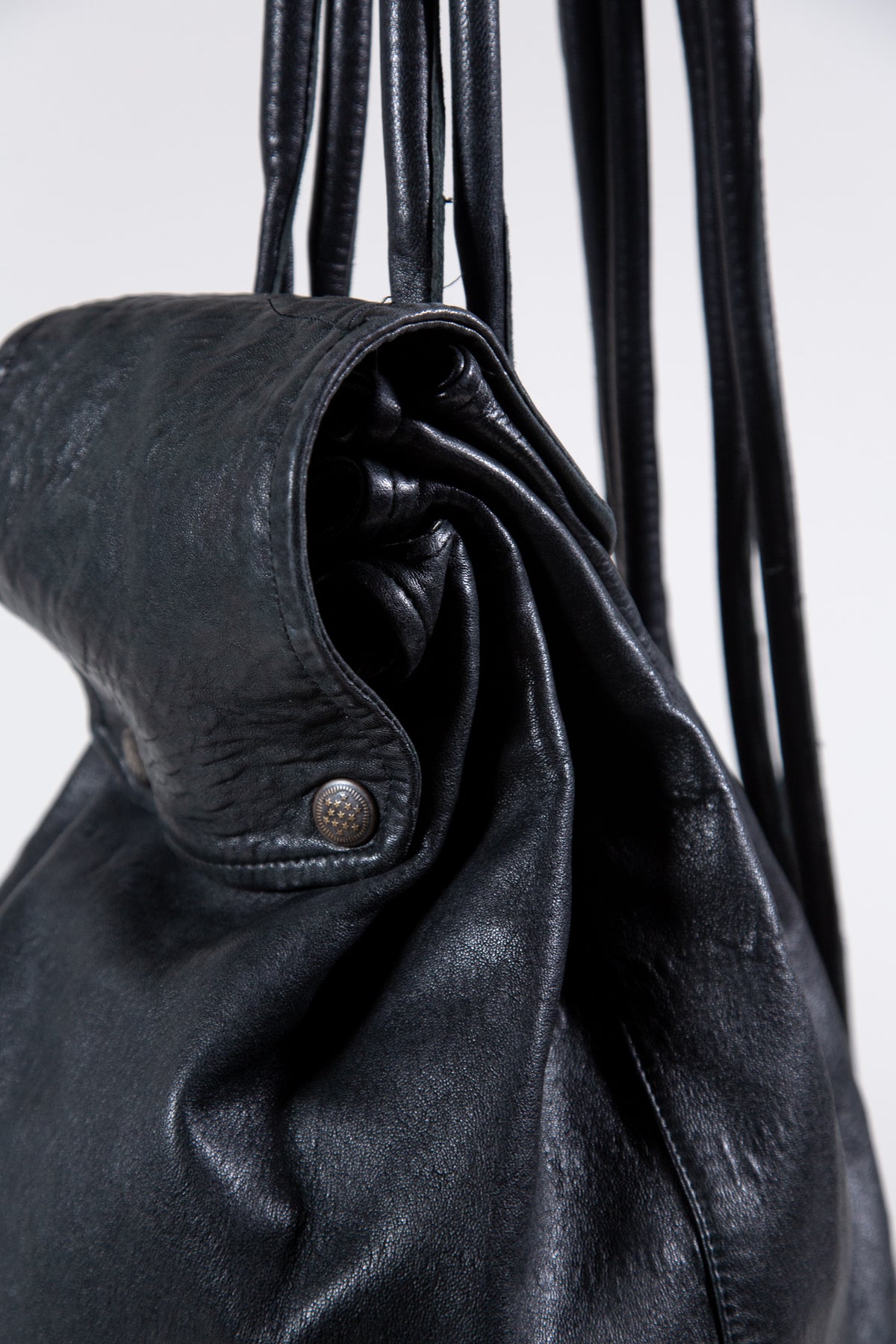BLACK LEATHER MULTI-STRAP BACKPACK BAG