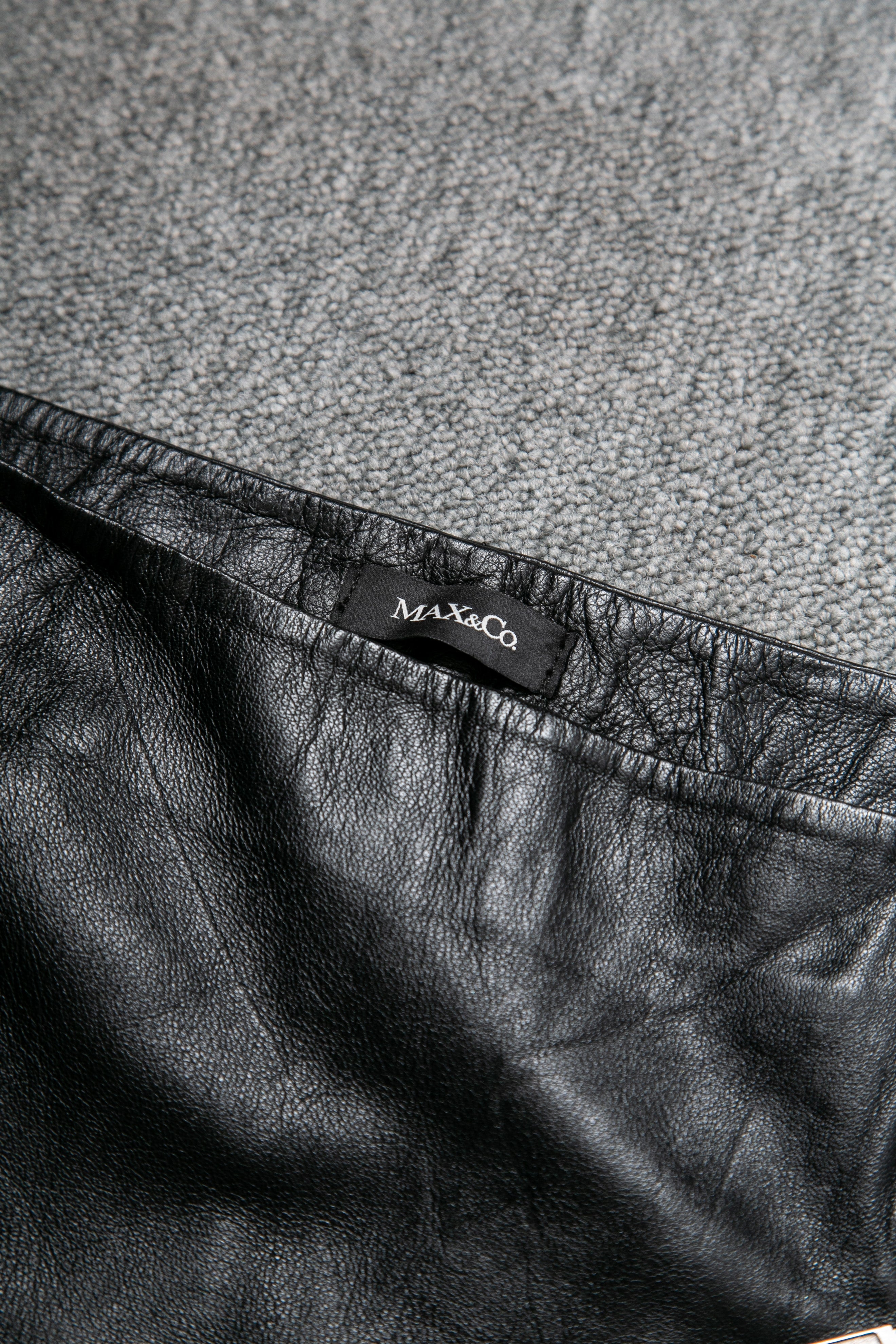LEATHER ASSYMETRIC ZIPPERD SKIRT
