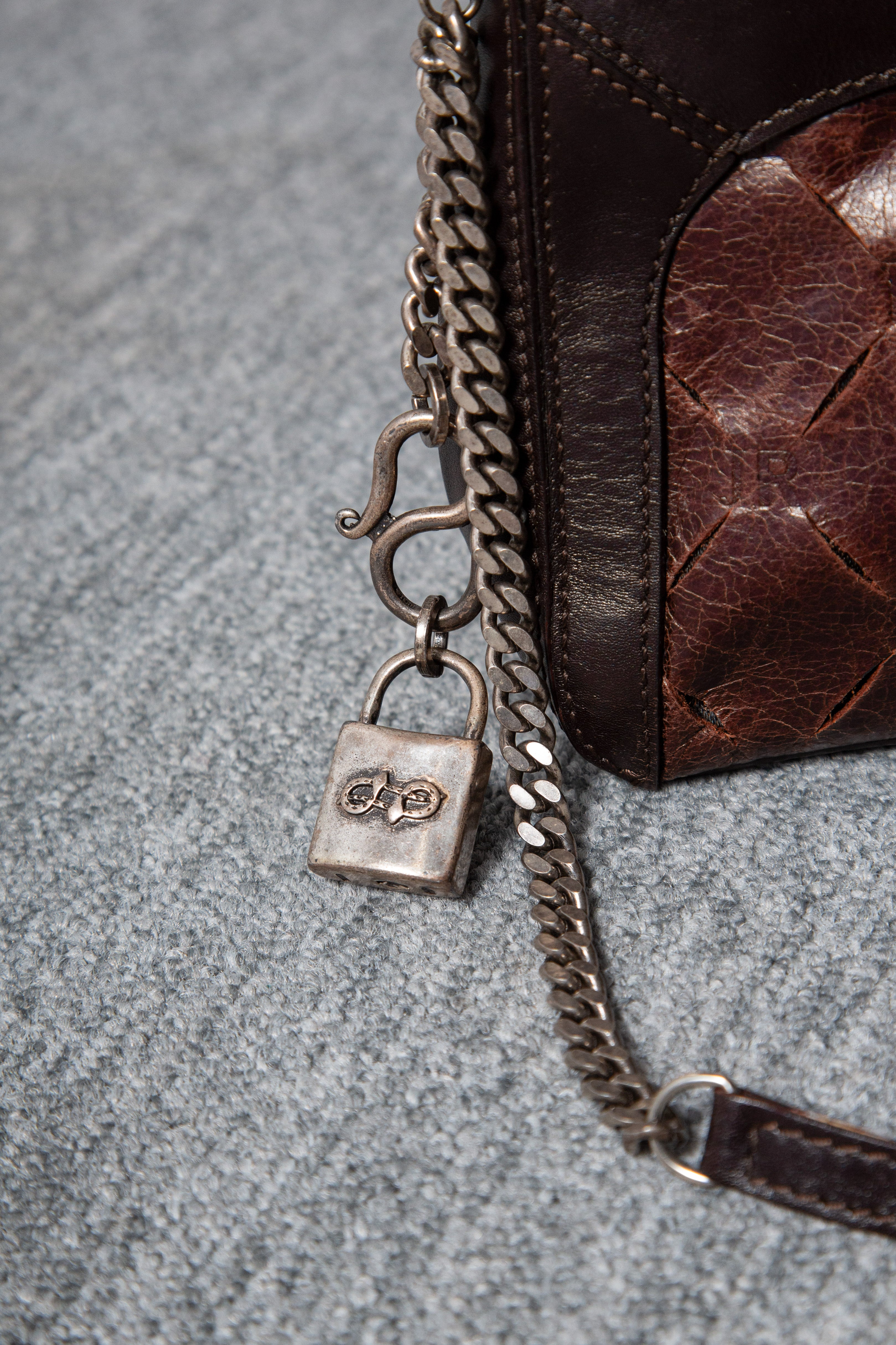 LEATHER CARMS HANDBAG