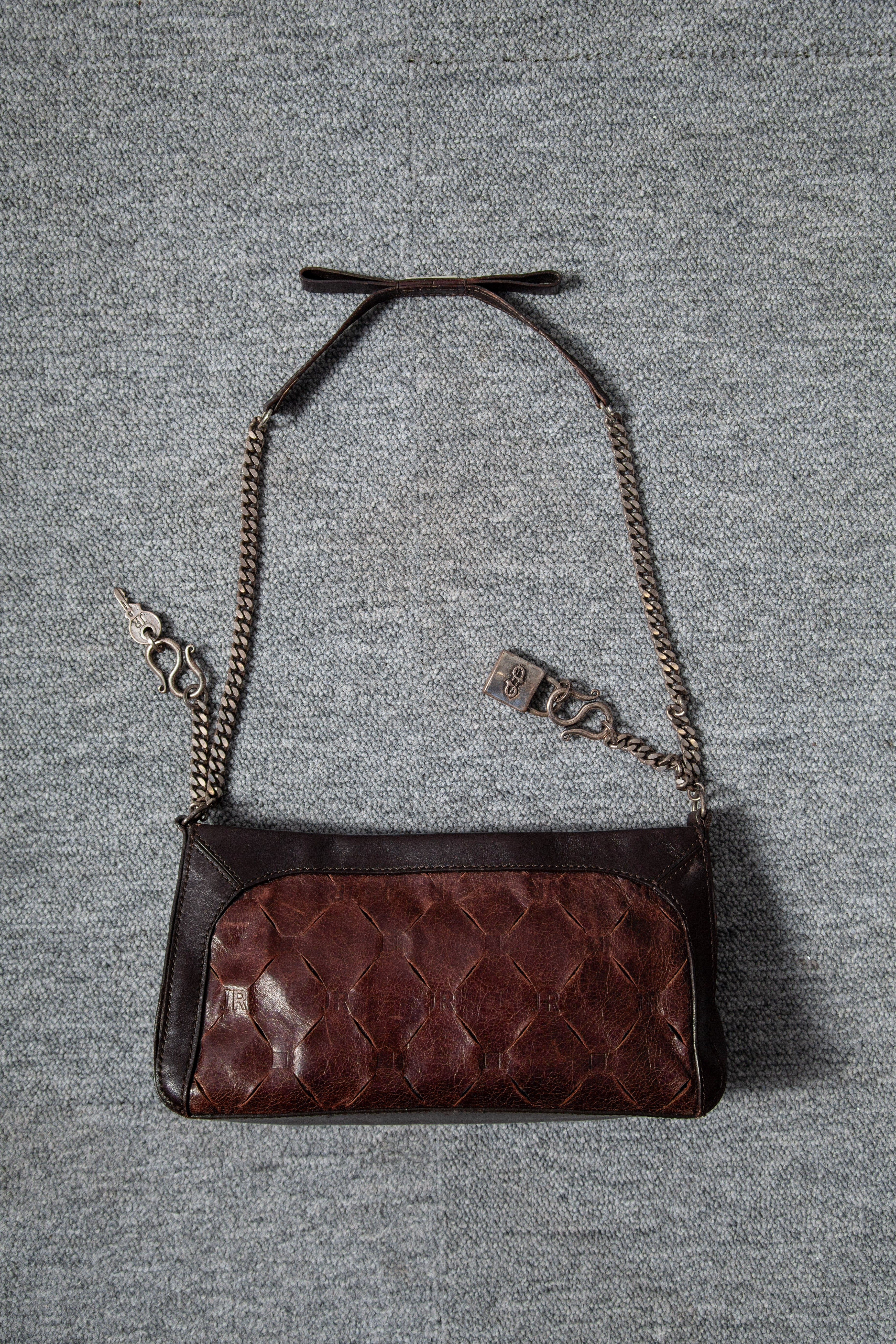 LEATHER CARMS HANDBAG
