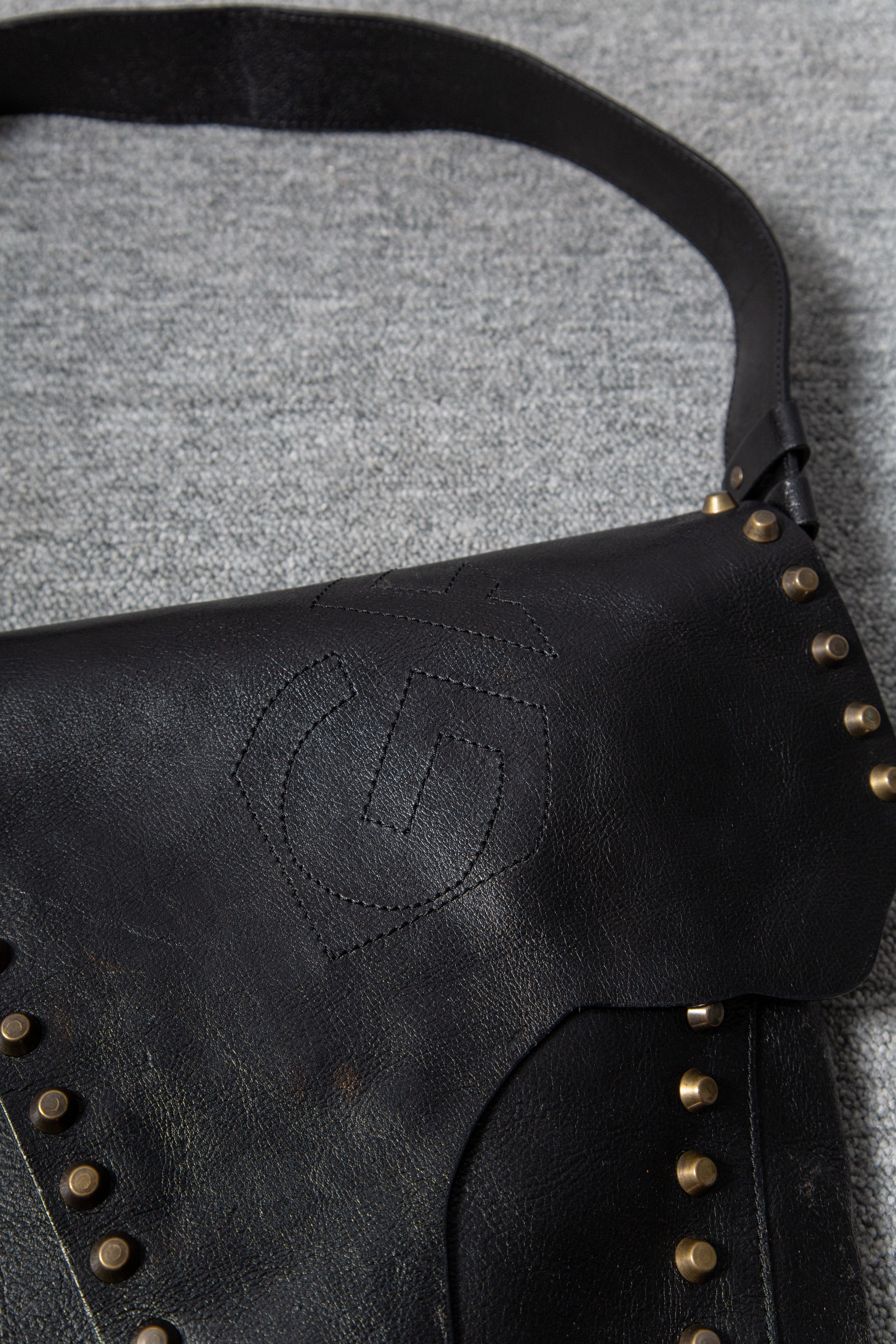 LEATHER ASYMMETRICAL STUDS BAG