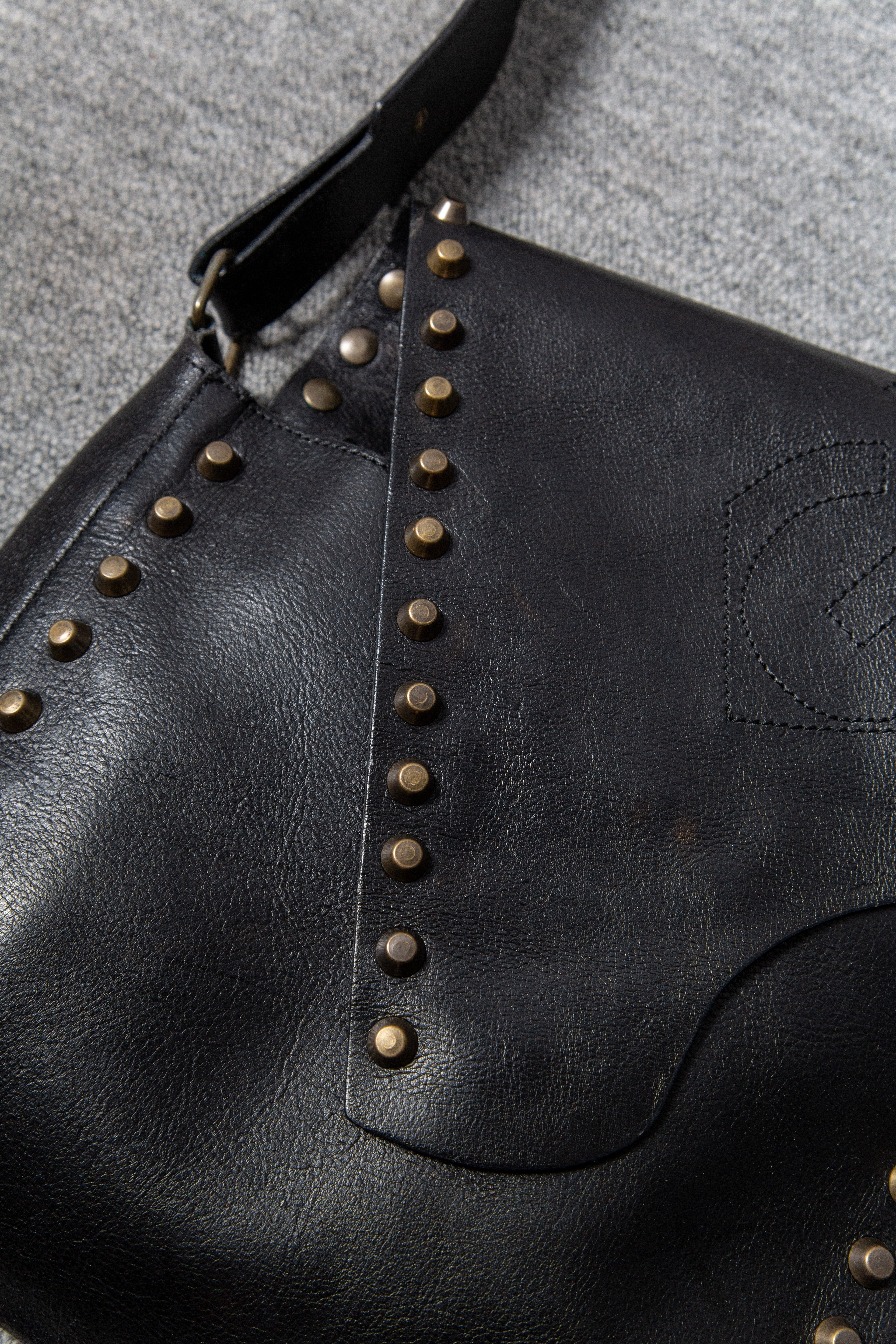 LEATHER ASYMMETRICAL STUDS BAG
