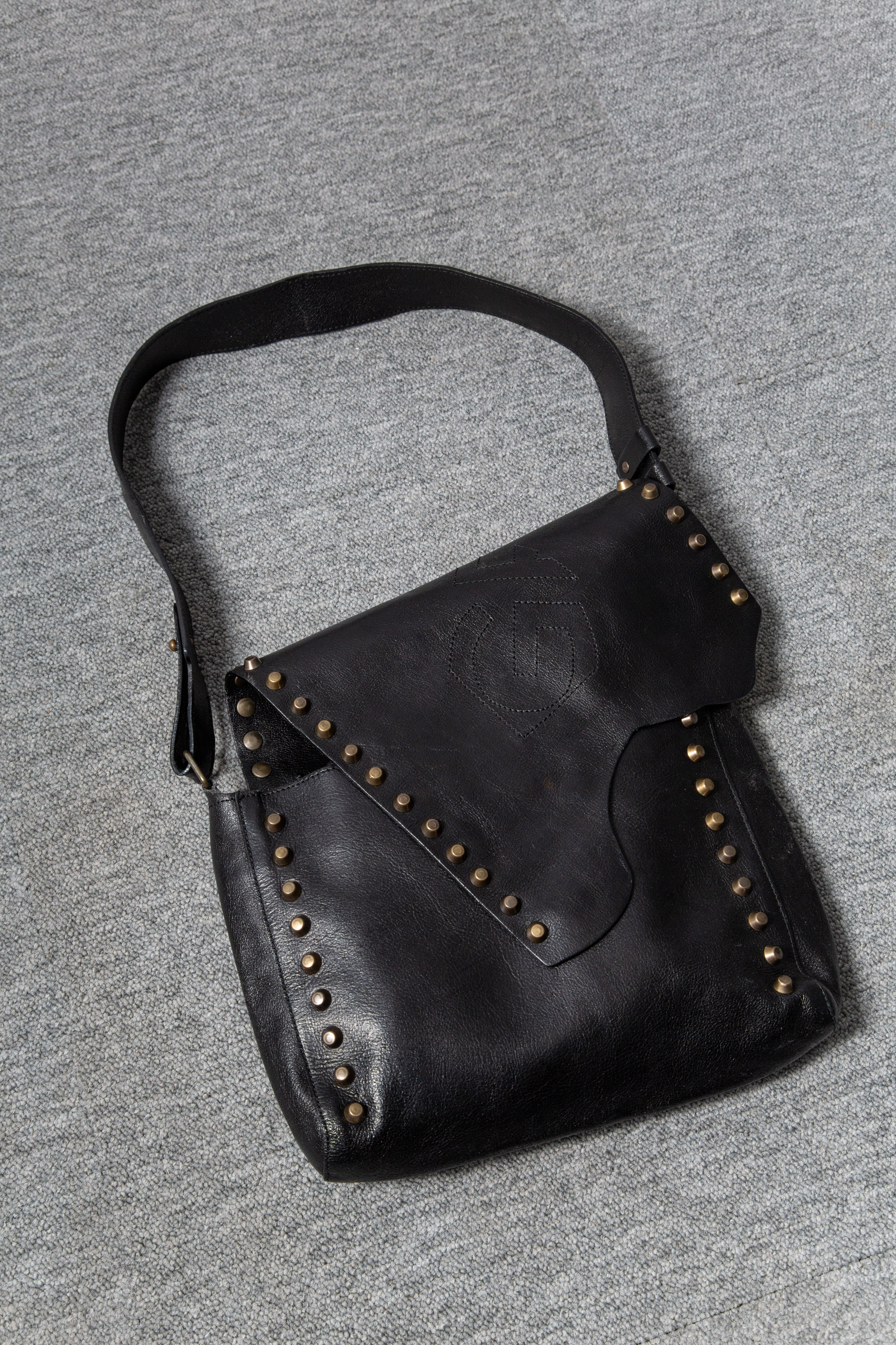 LEATHER ASYMMETRICAL STUDS BAG