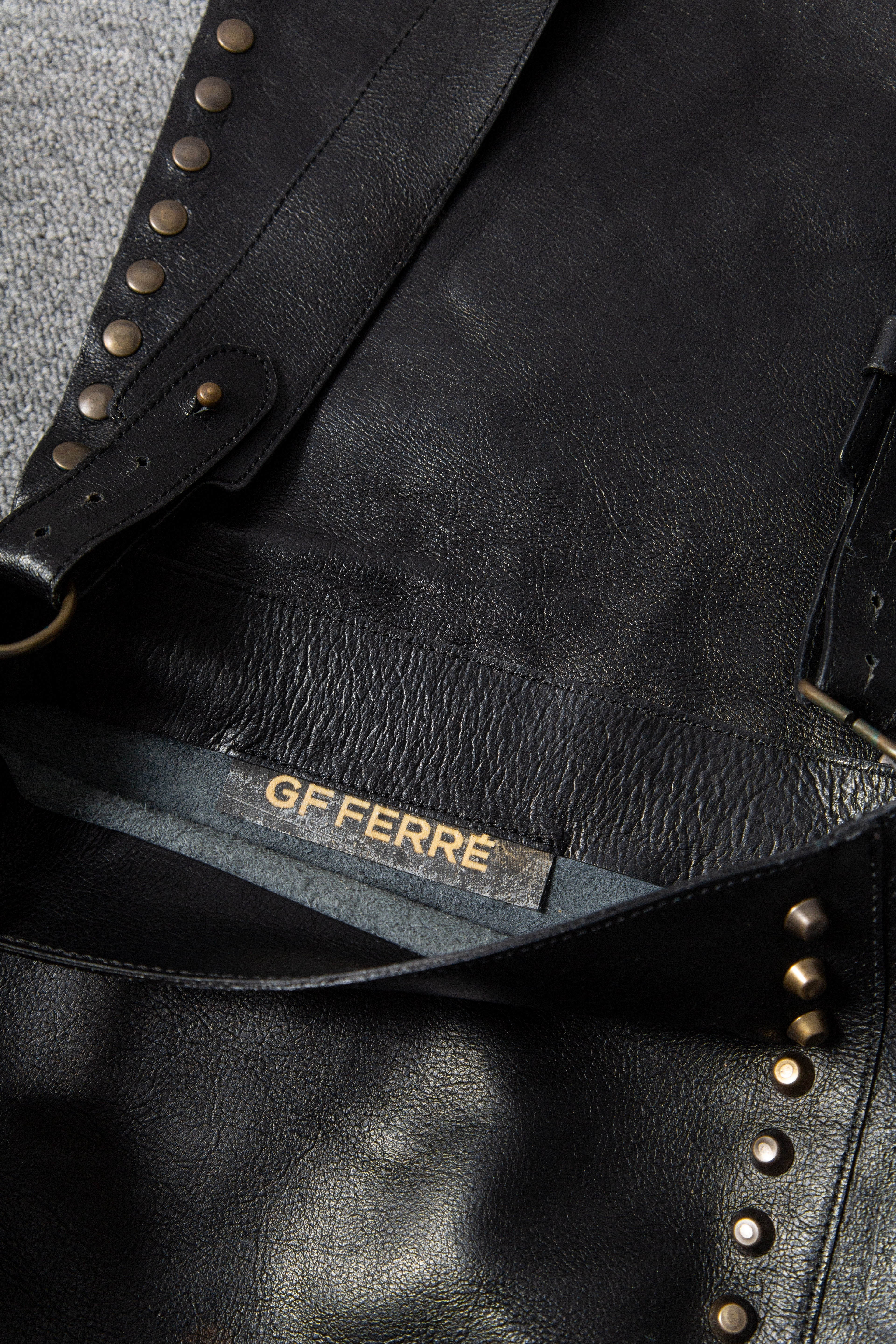 LEATHER ASYMMETRICAL STUDS BAG