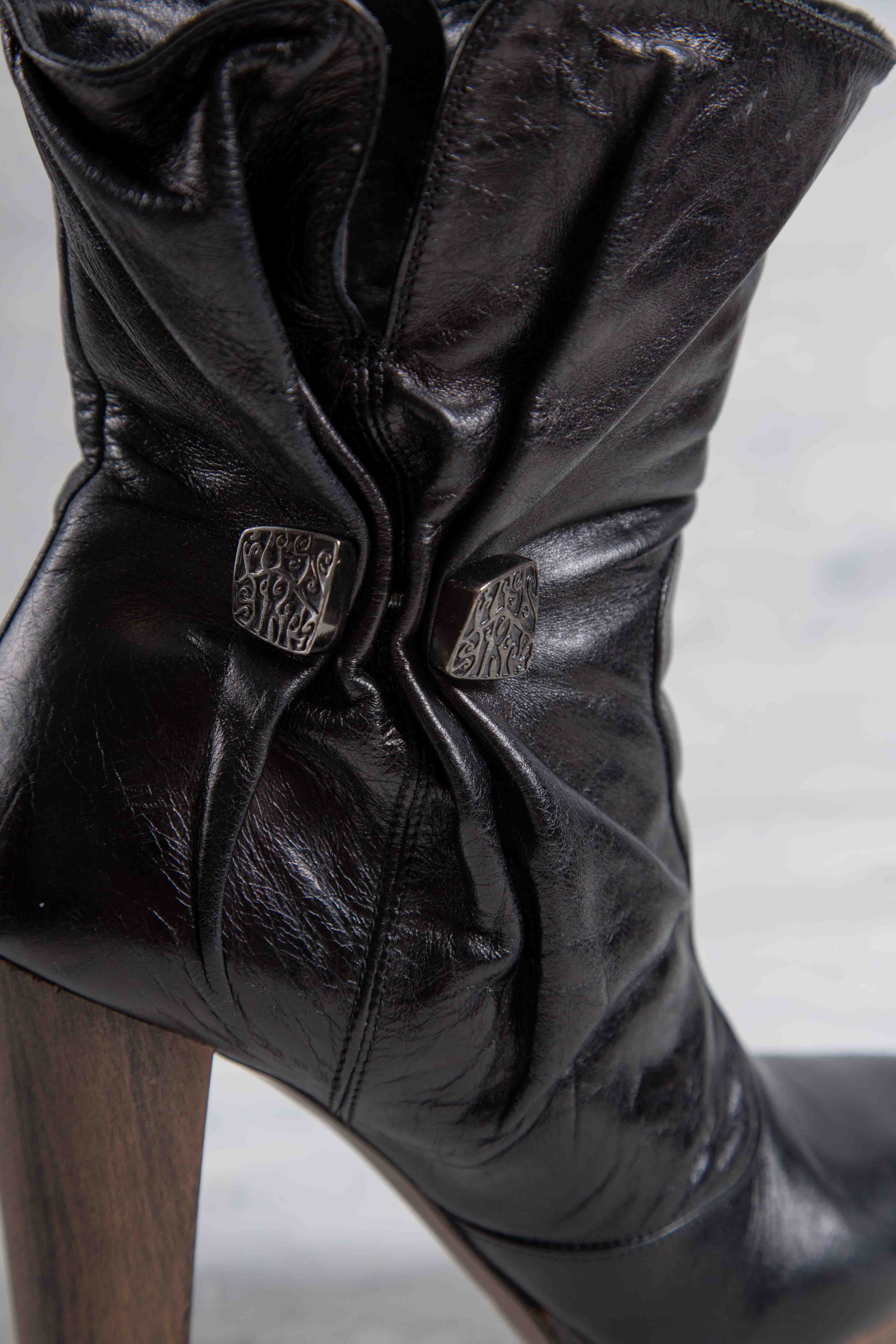 LEATHER PLATFORM HEEL BOOTS