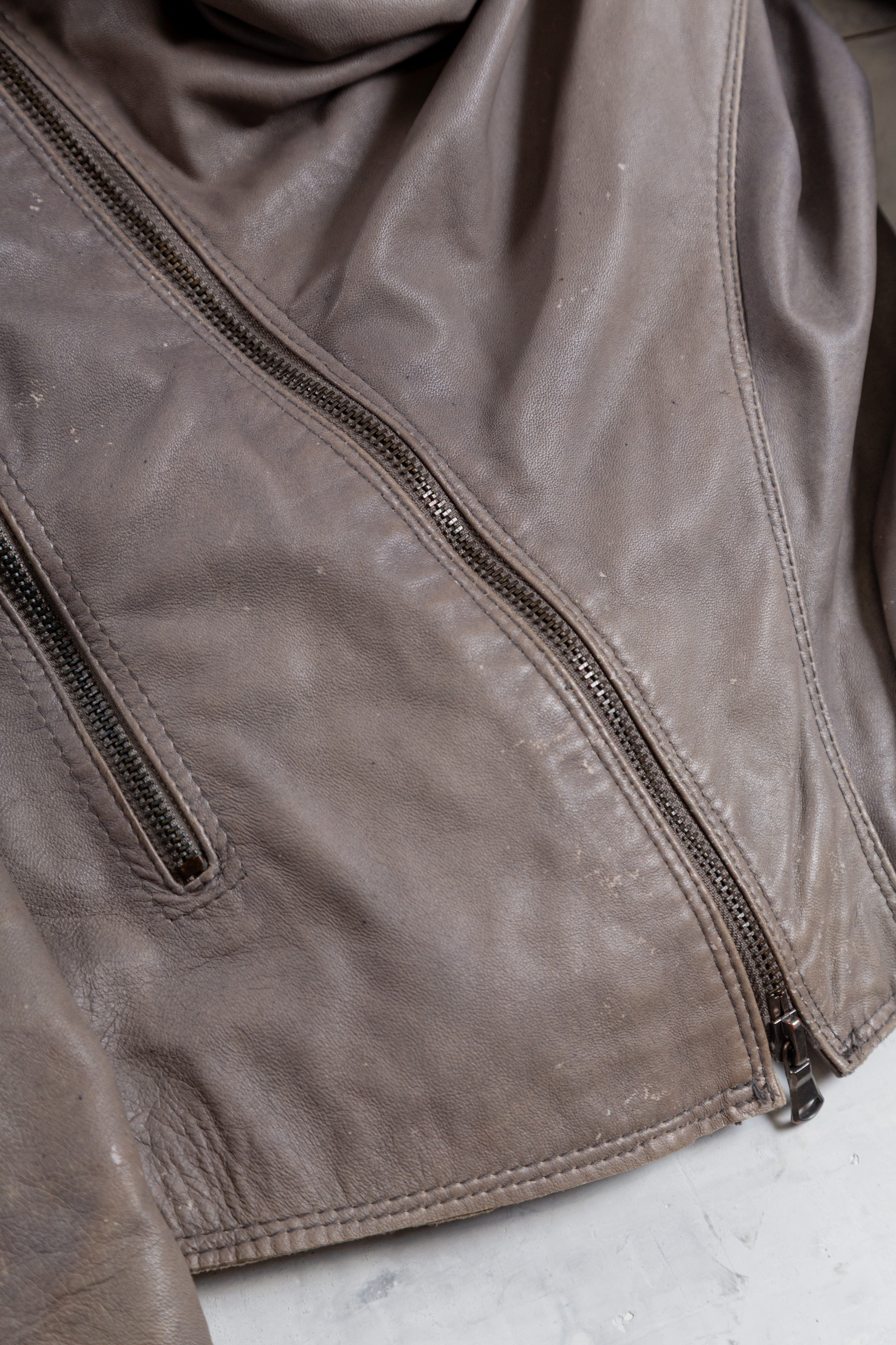 ASYMMETRIC DRAIPED LEATHER JACKET