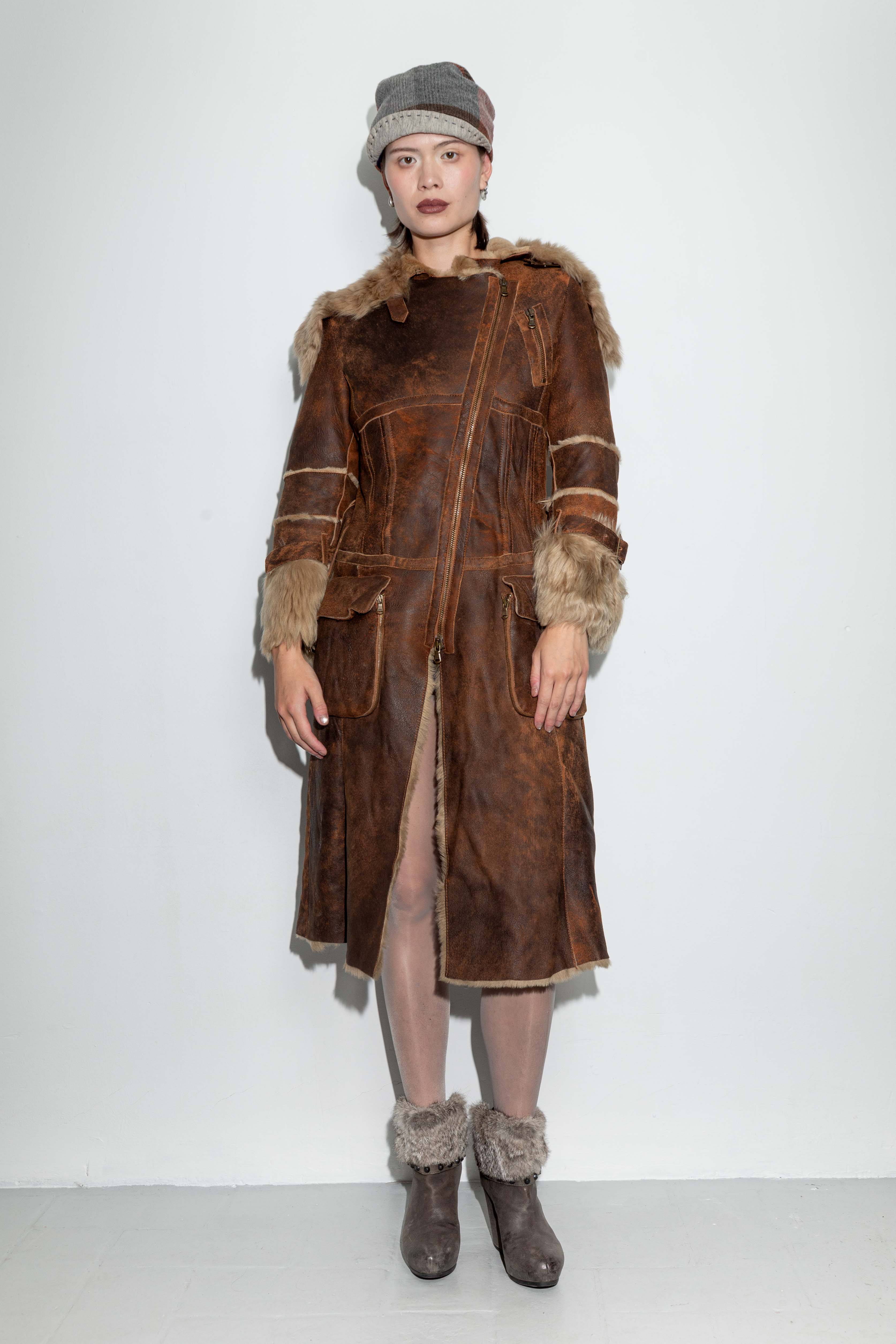 BROWN DISTRESSED LEATHER AND FUR COAT