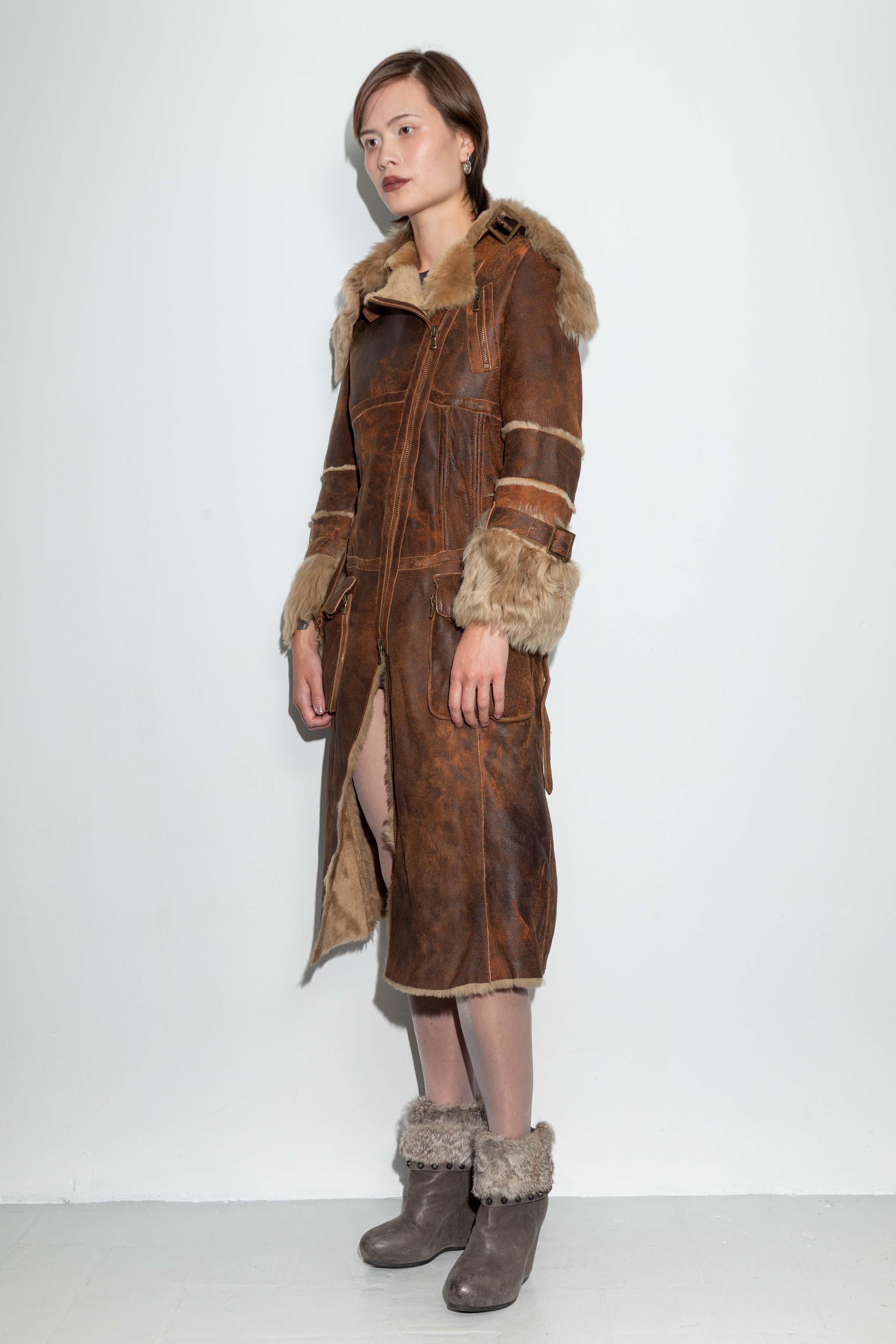 BROWN DISTRESSED LEATHER AND FUR COAT