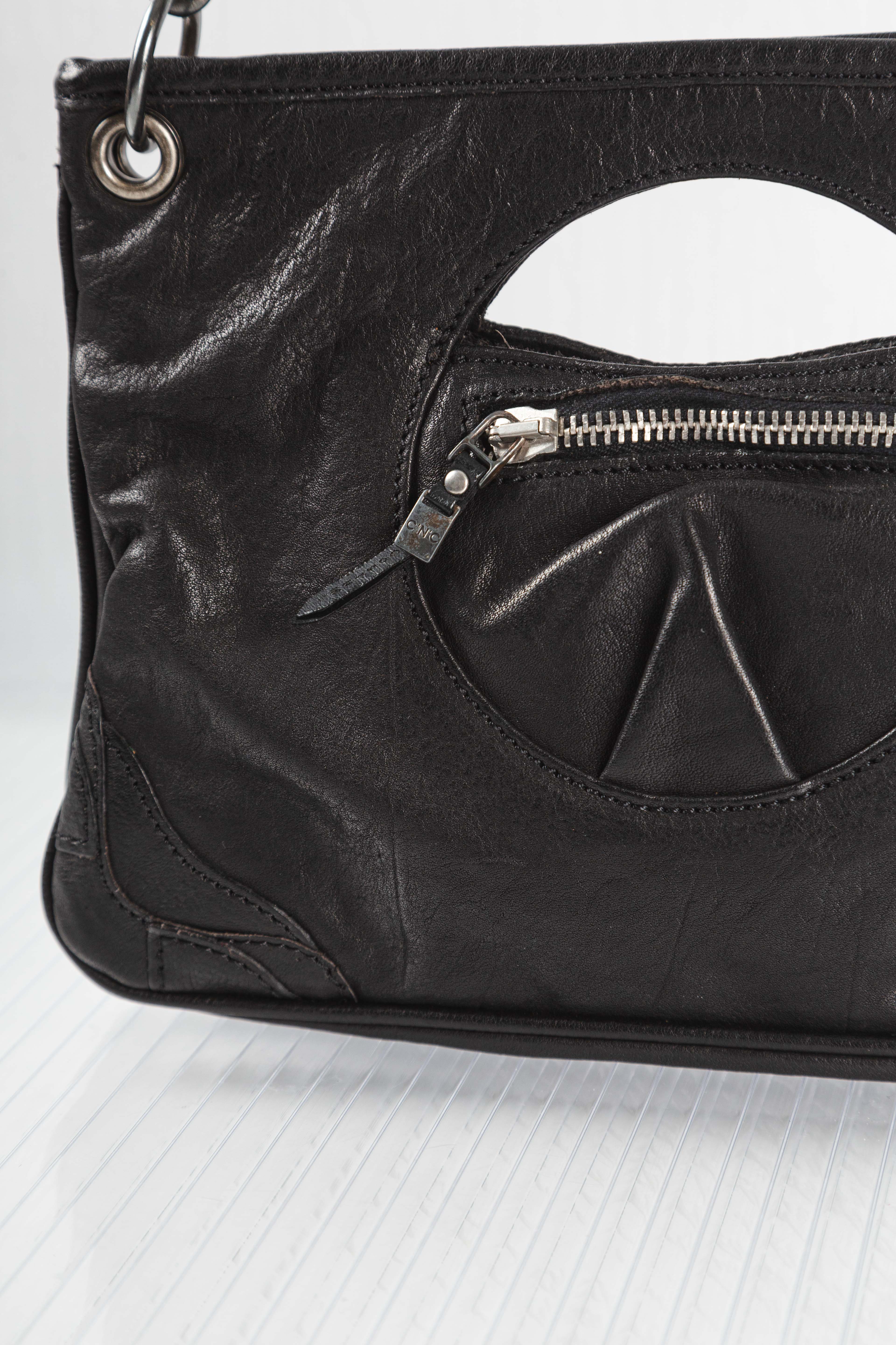 CUT-OUT LEATHER CLUTCH