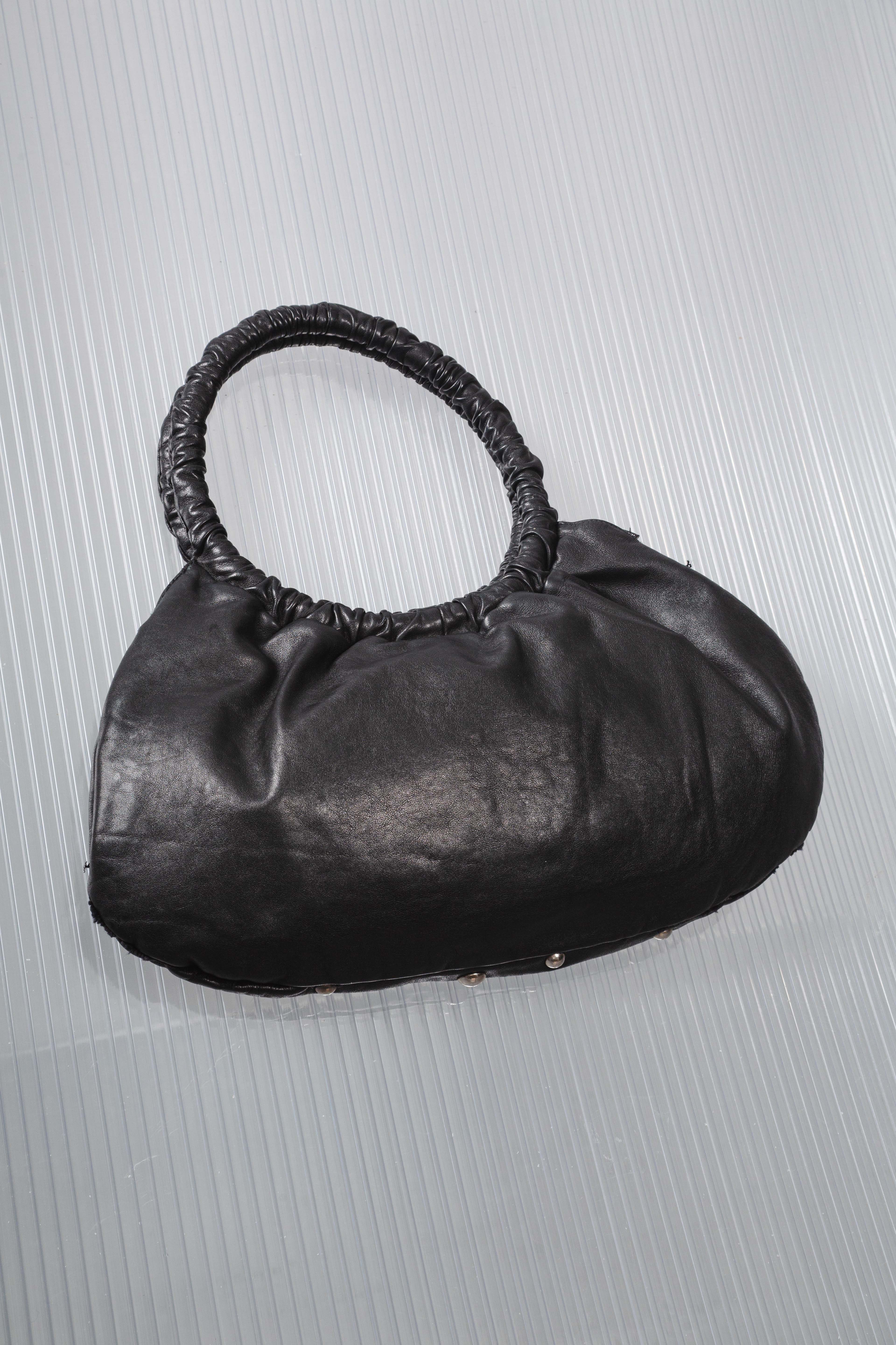 STUDDED DOTS LEATHER HANDBAG