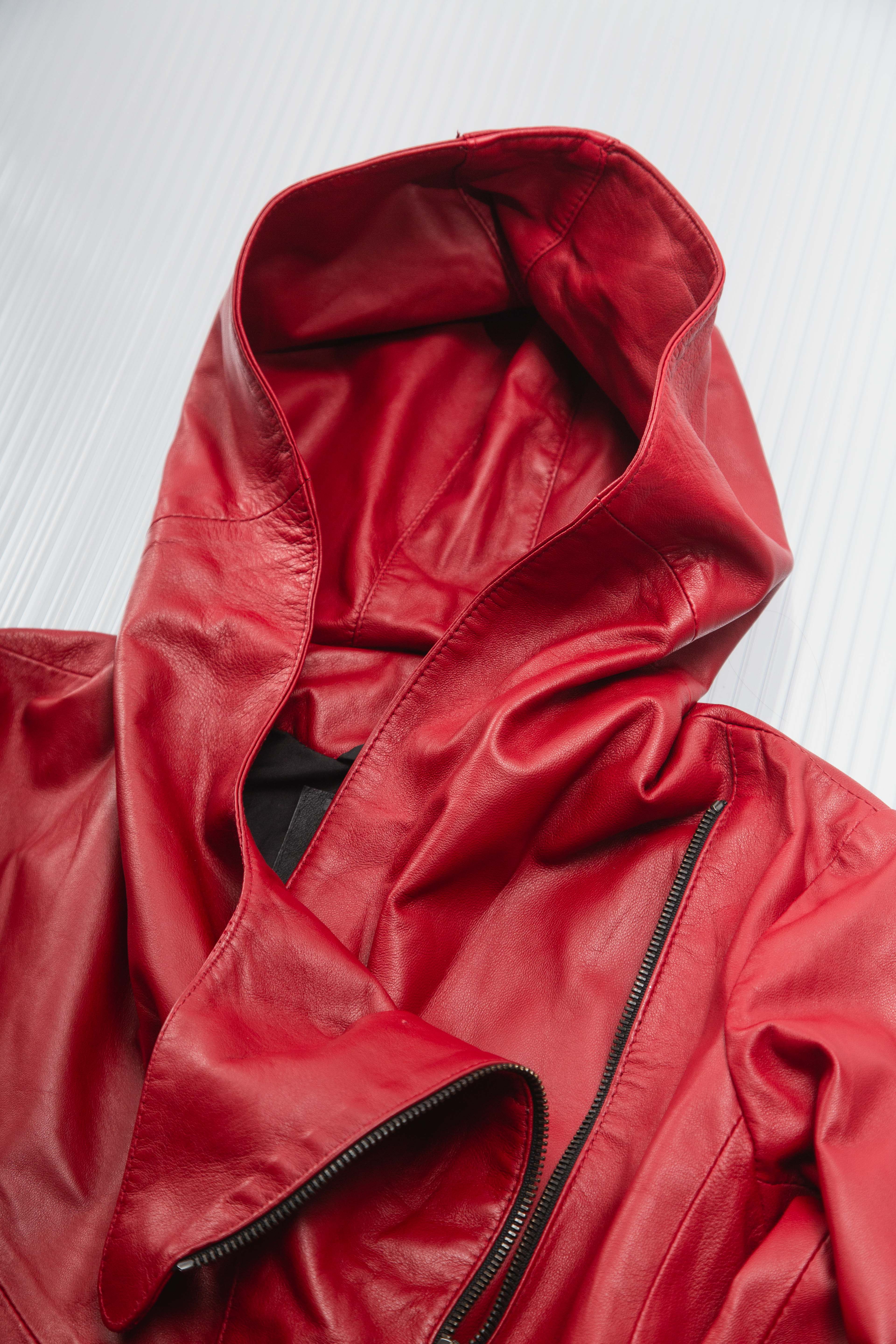 RED ASYMMETRIC DRAPED HODDED LEATHER JACKET