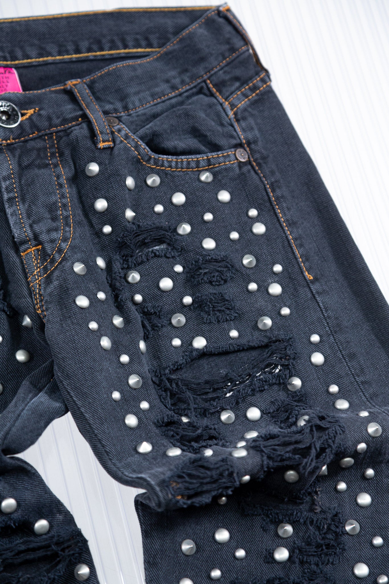 DISTRESSED SILVER STUDDED CAPRI PANTS