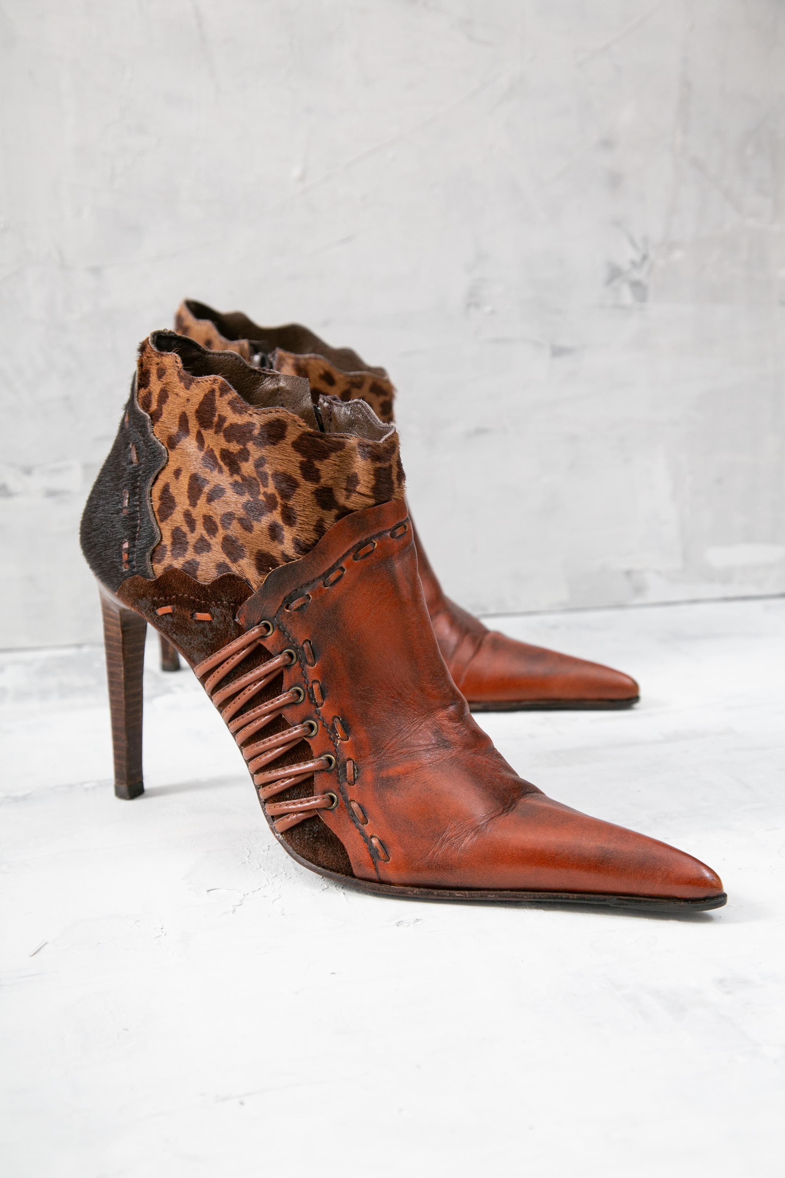FUR PATCHES POINTY BOOTS