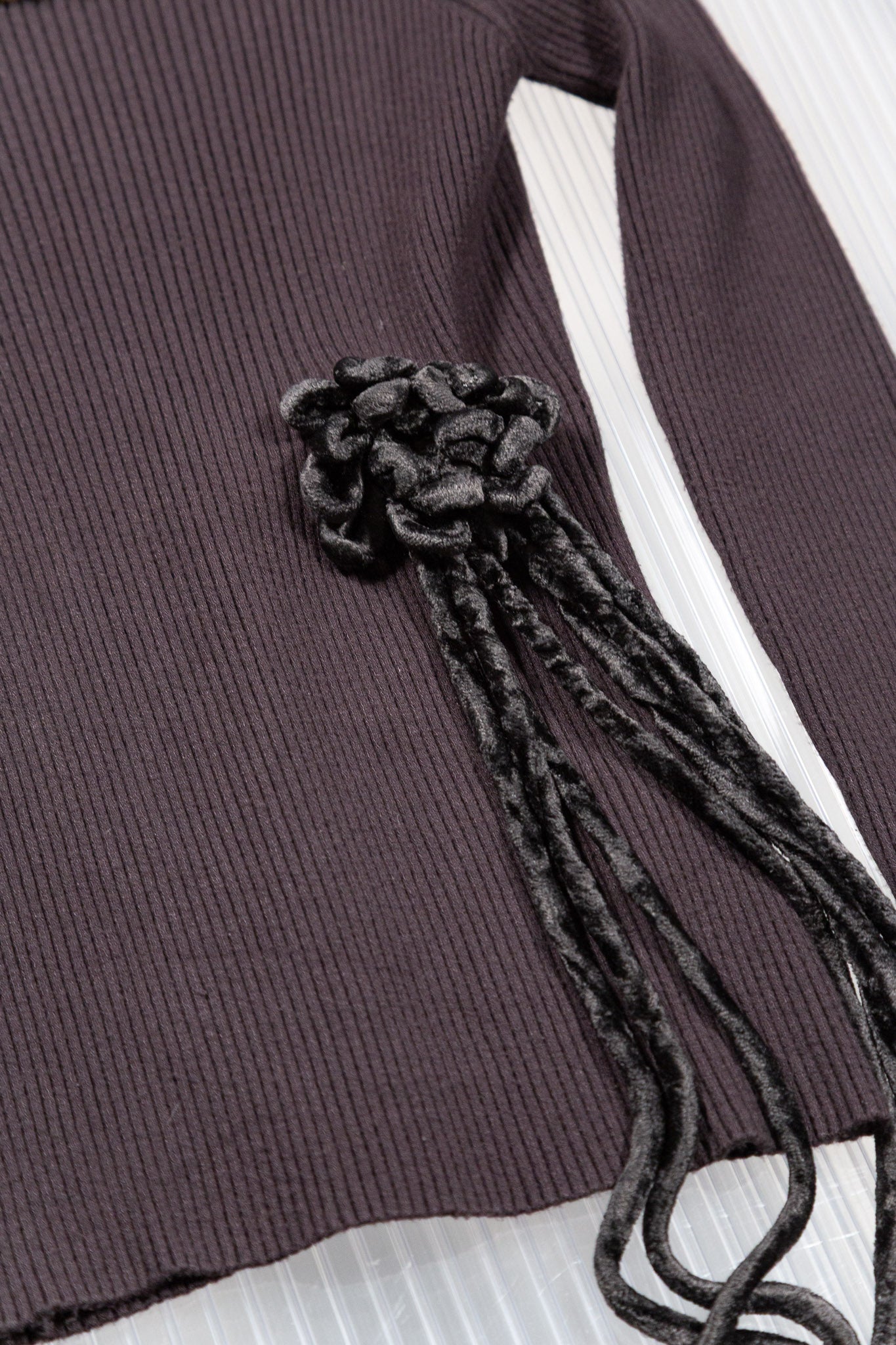WOVEN FLOWER COCKADE TOP