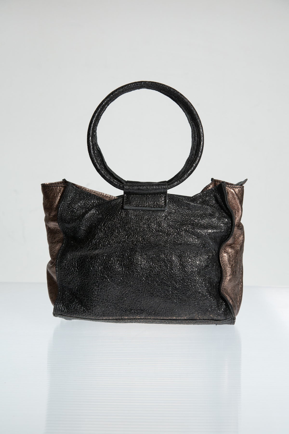 BRONZE LEATHER SCULPTURAL HANDLE BAG