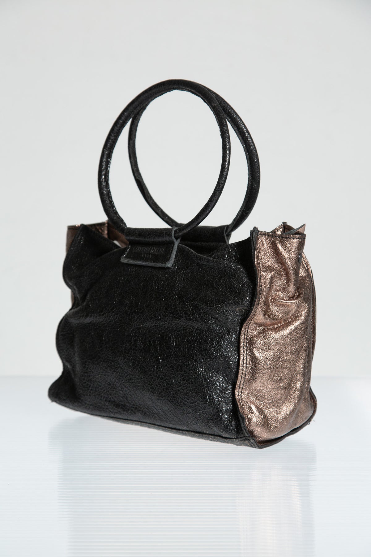 BRONZE LEATHER SCULPTURAL HANDLE BAG