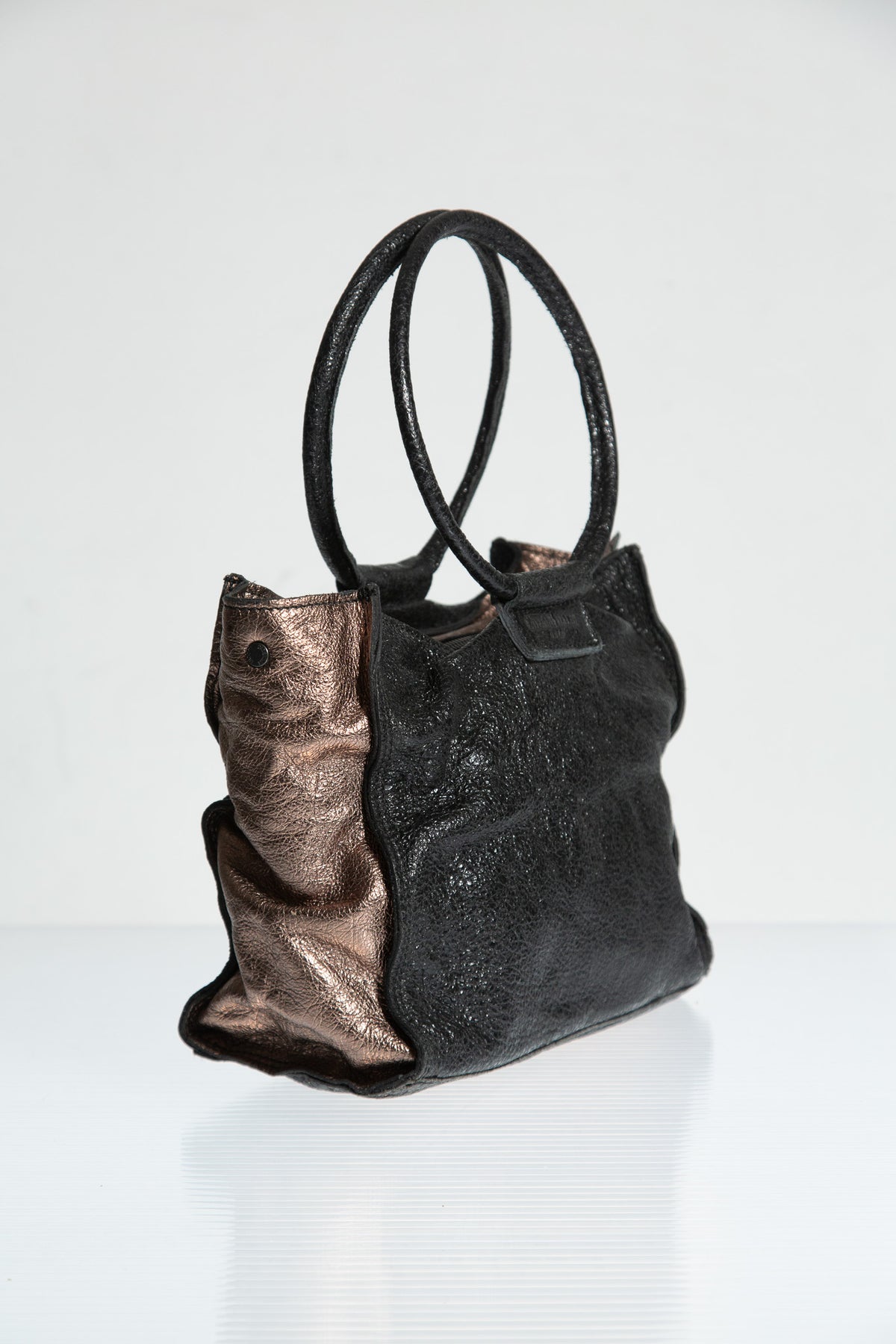 BRONZE LEATHER SCULPTURAL HANDLE BAG