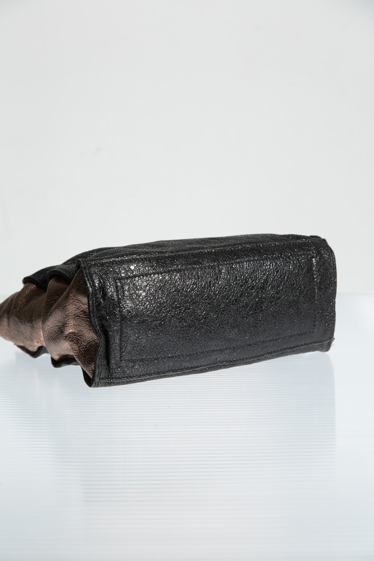 BRONZE LEATHER SCULPTURAL HANDLE BAG