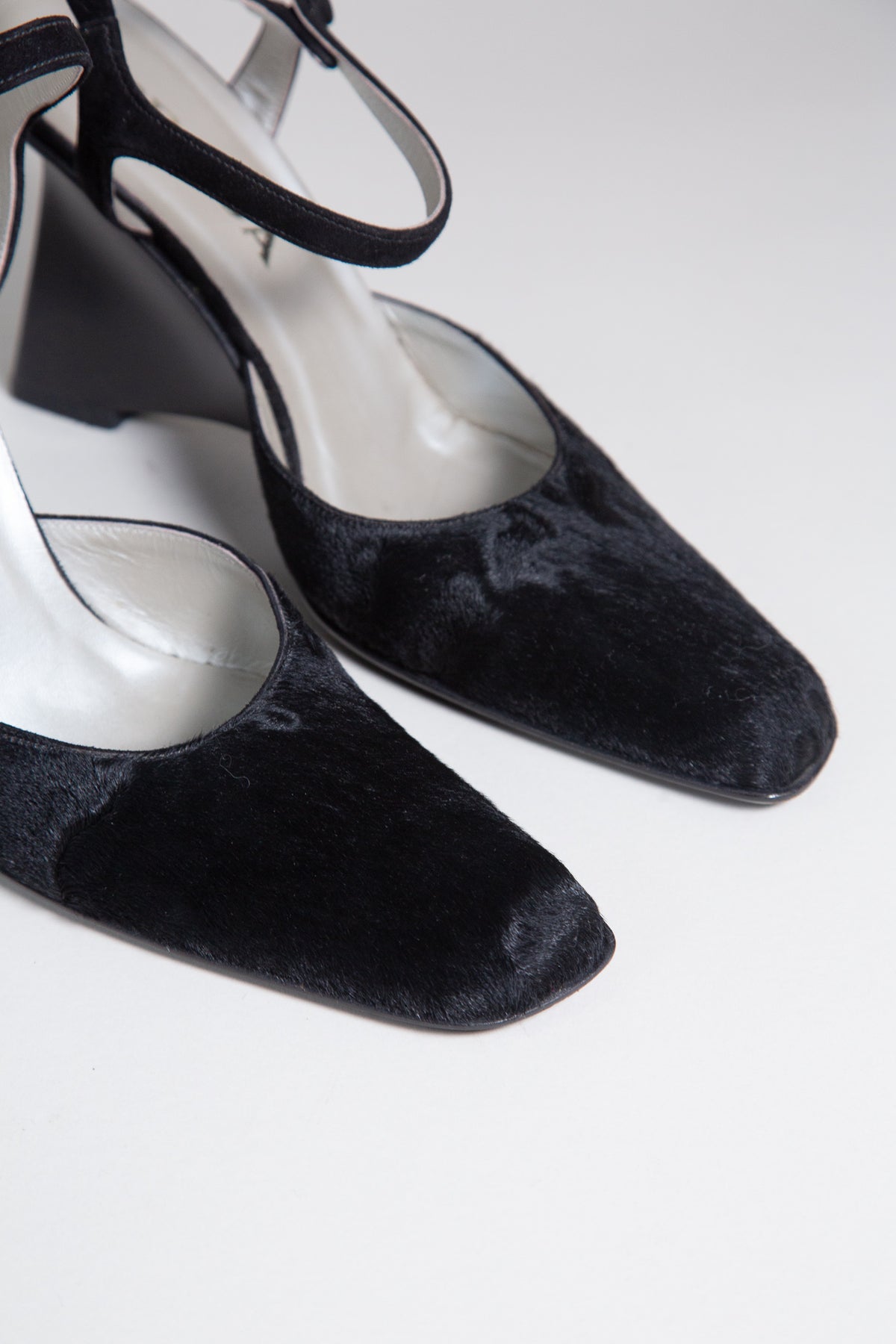 PRADA BLACK PONY HAIR SCULPTURAL HEELS