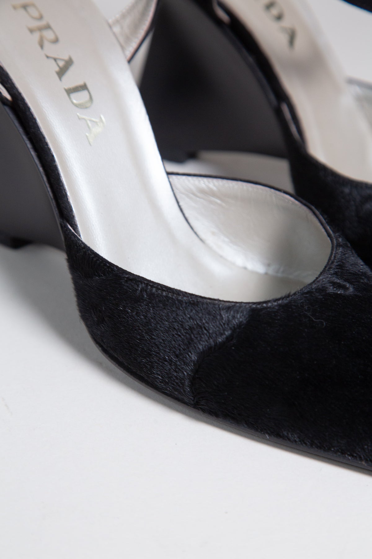 PRADA BLACK PONY HAIR SCULPTURAL HEELS
