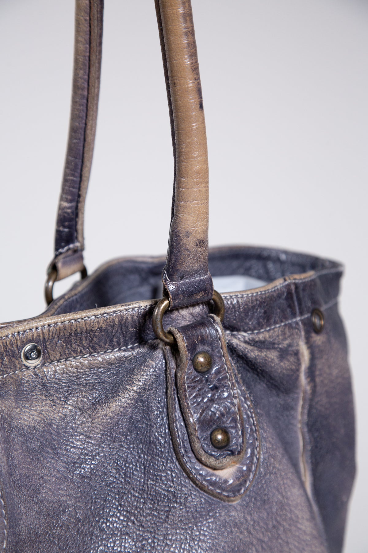 DISTRESSED LEATHER STUDDED SHOULDER BAG