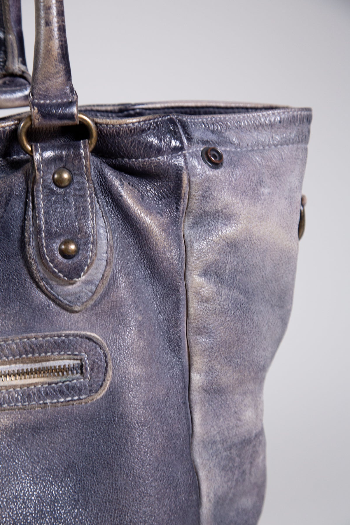 DISTRESSED LEATHER STUDDED SHOULDER BAG