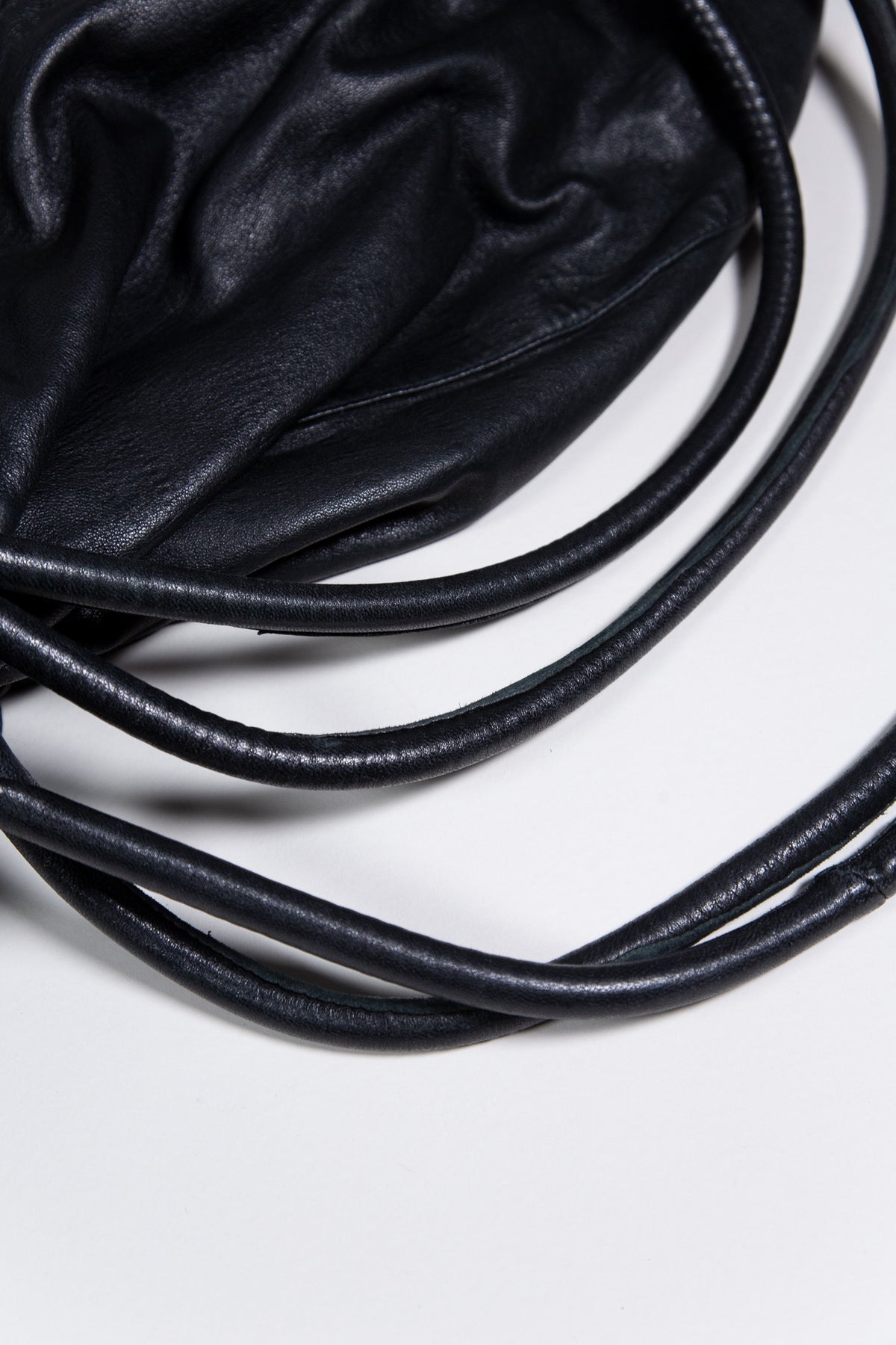 BLACK LEATHER MULTI-STRAP BACKPACK BAG