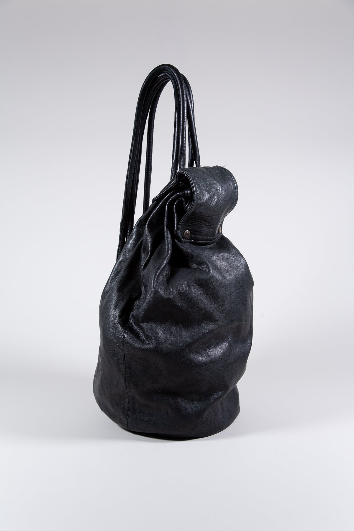 BLACK LEATHER MULTI-STRAP BACKPACK BAG