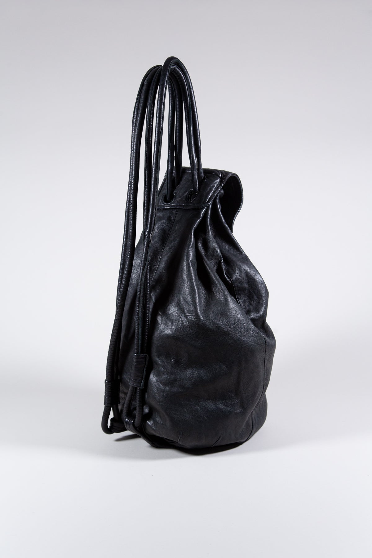 BLACK LEATHER MULTI-STRAP BACKPACK BAG
