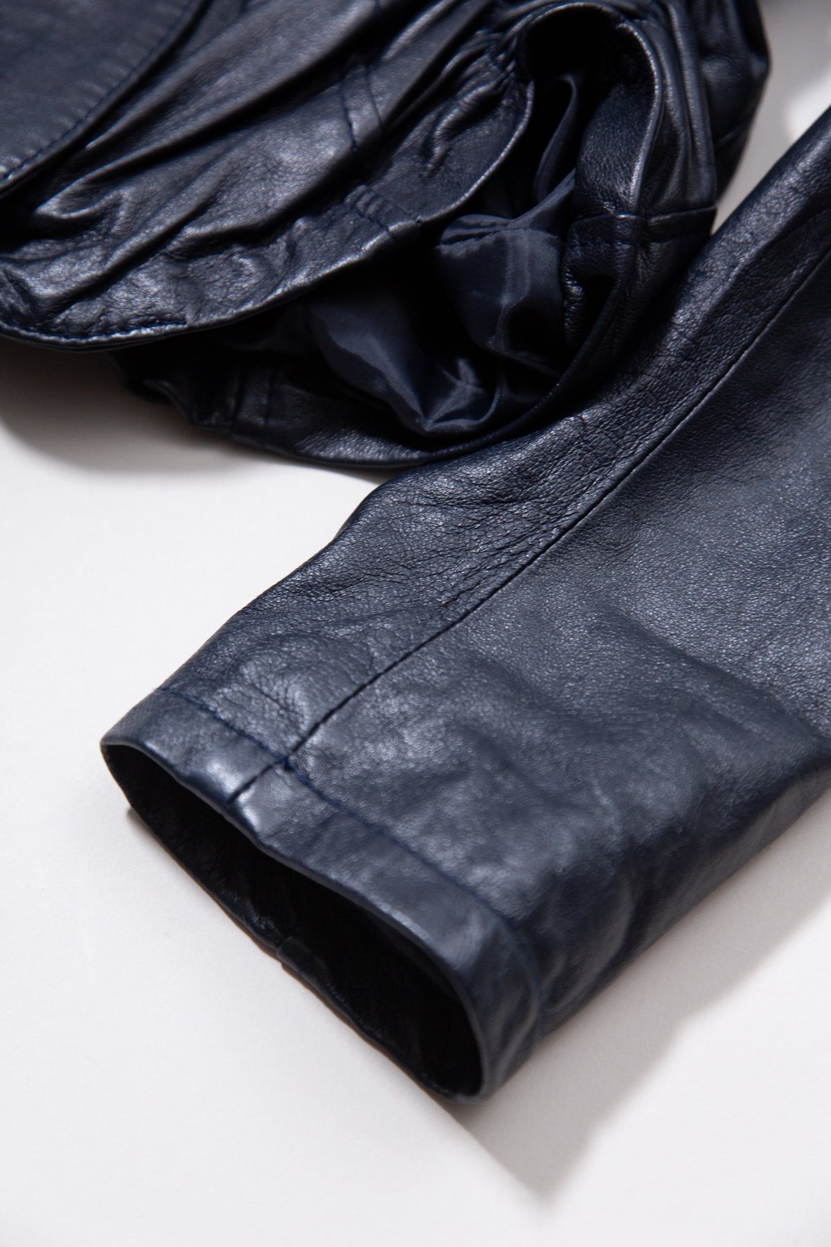 DARK BLUE RUCHED LEATHER JACKET