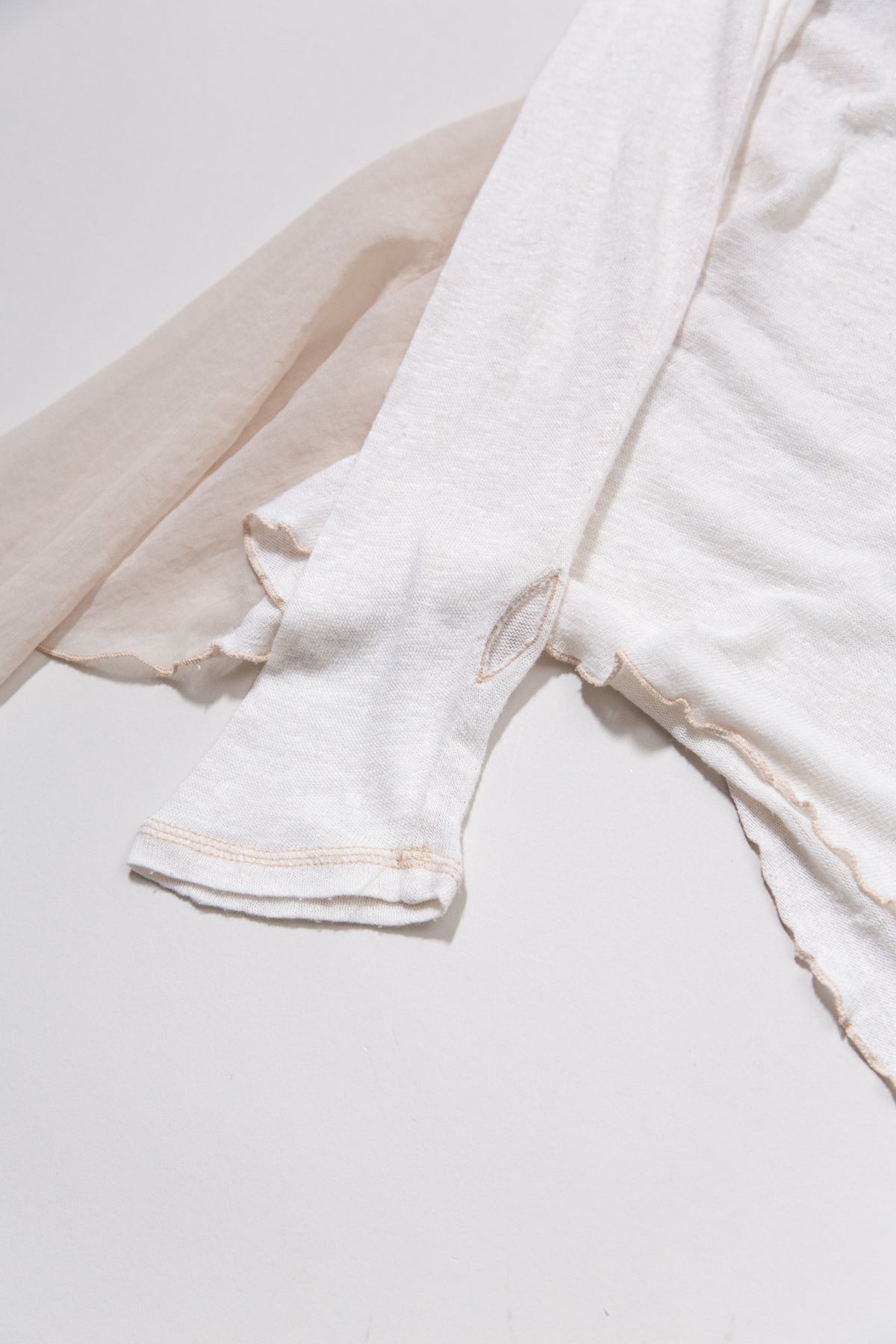ASYMMETRIC LACE DETAIL LONG TOP