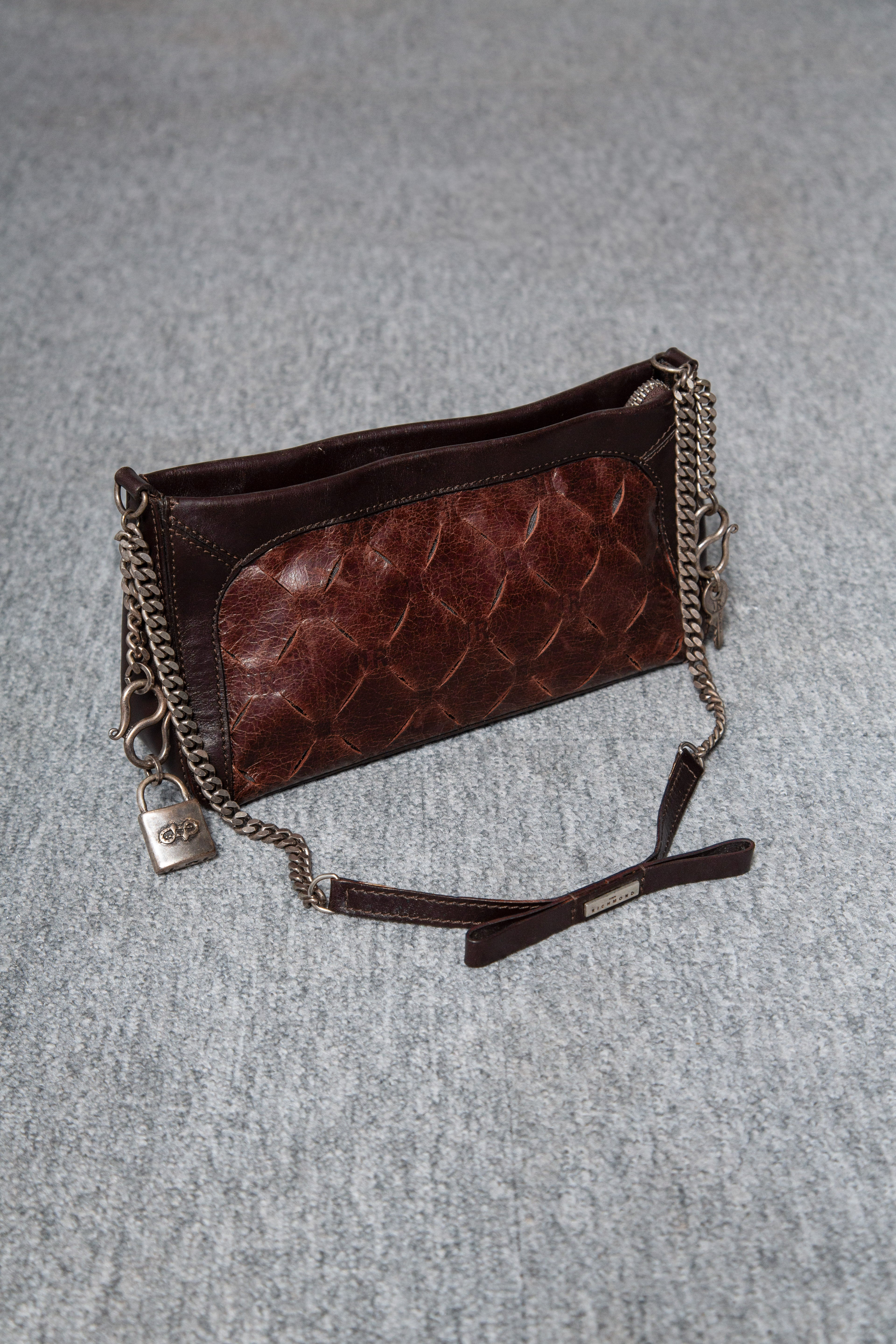 LEATHER CARMS HANDBAG