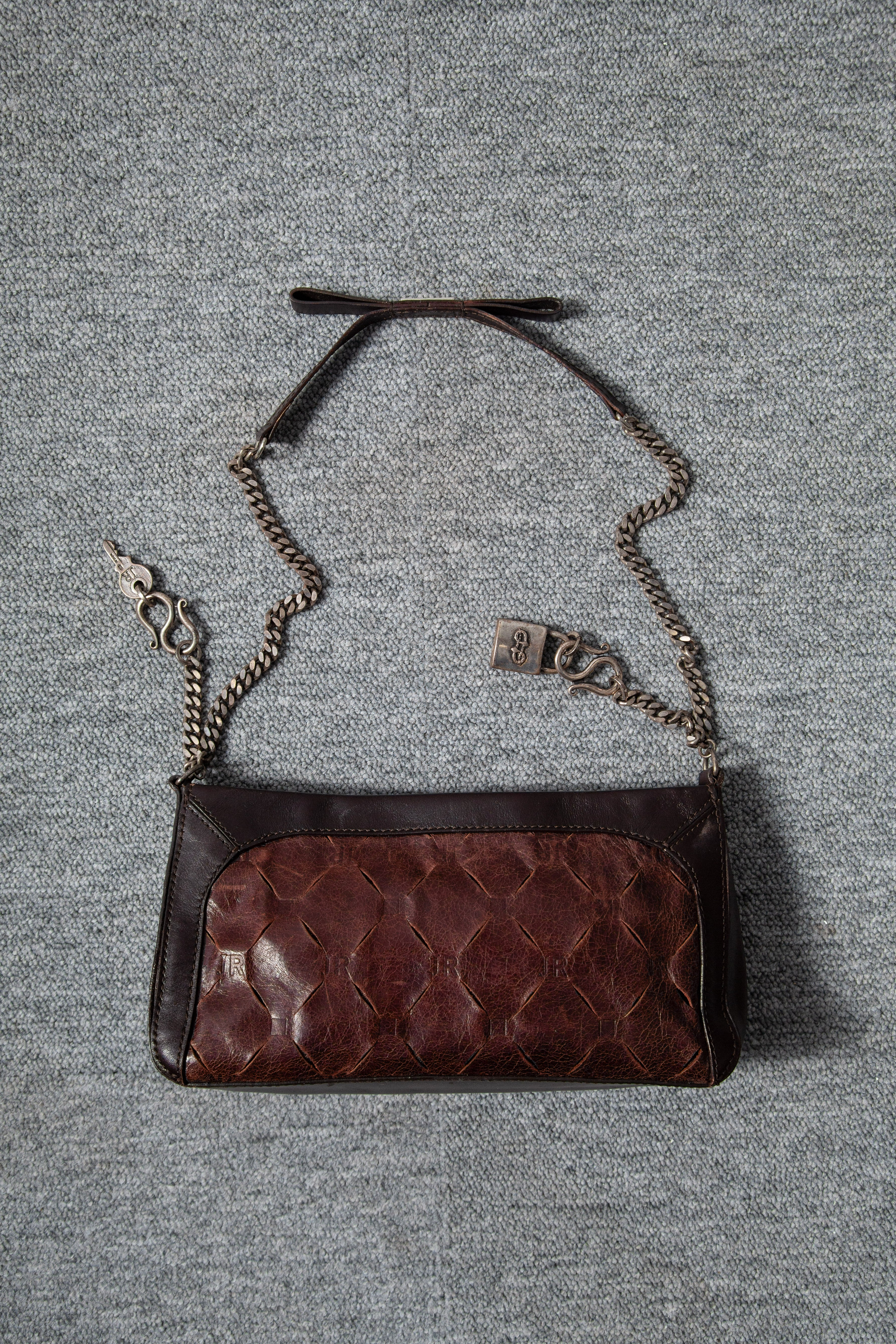 LEATHER CARMS HANDBAG