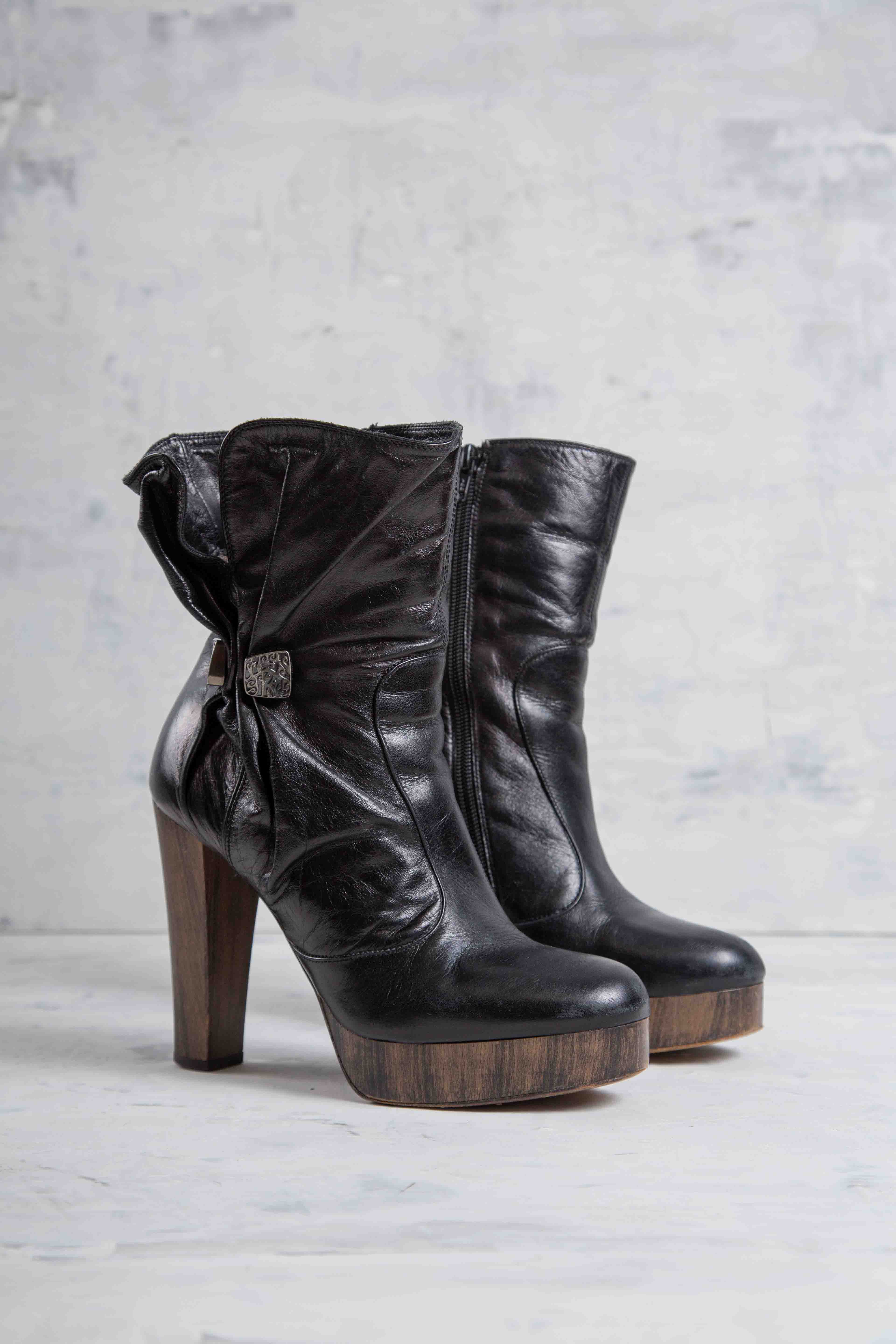 LEATHER PLATFORM HEEL BOOTS