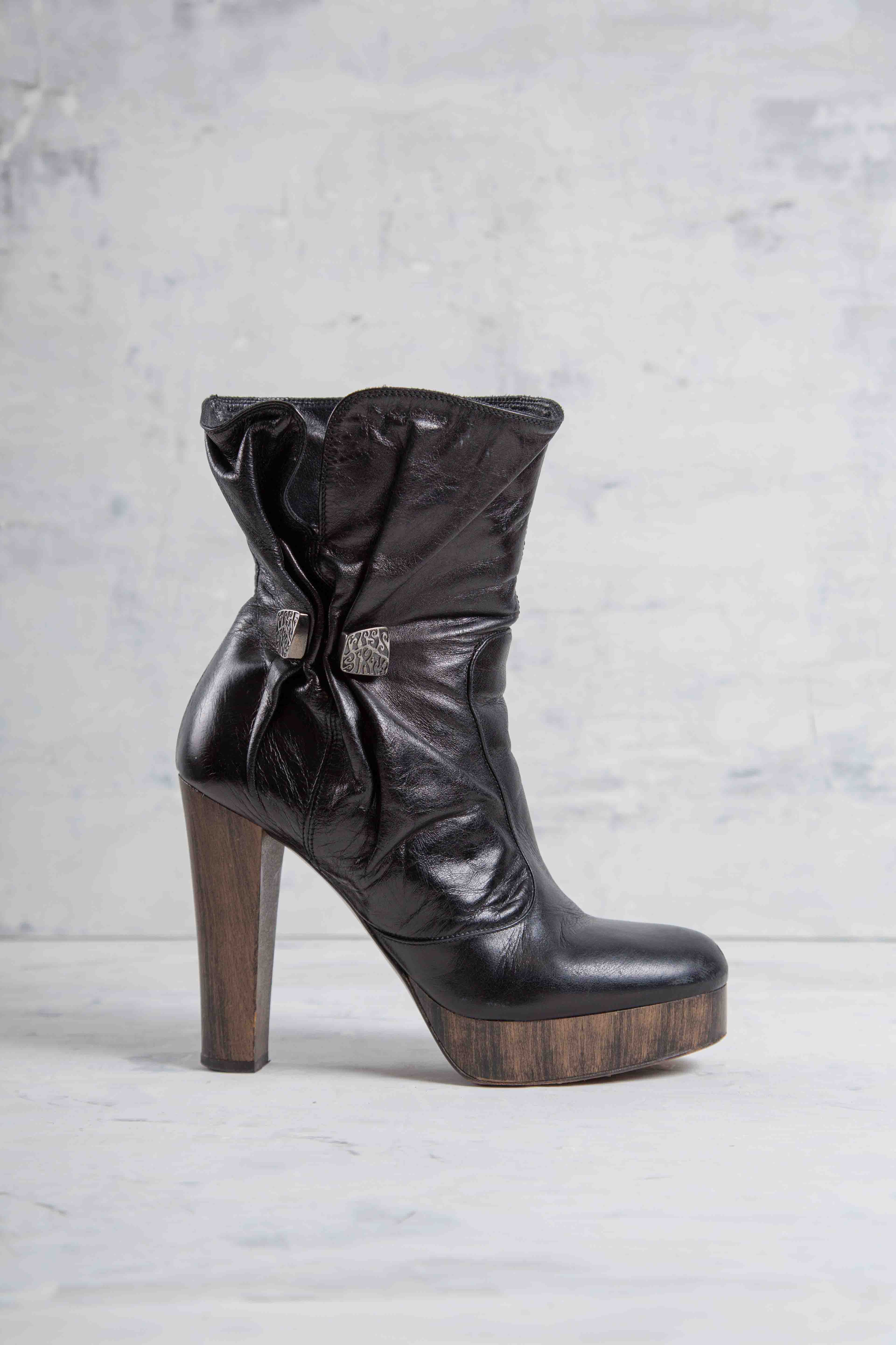 LEATHER PLATFORM HEEL BOOTS