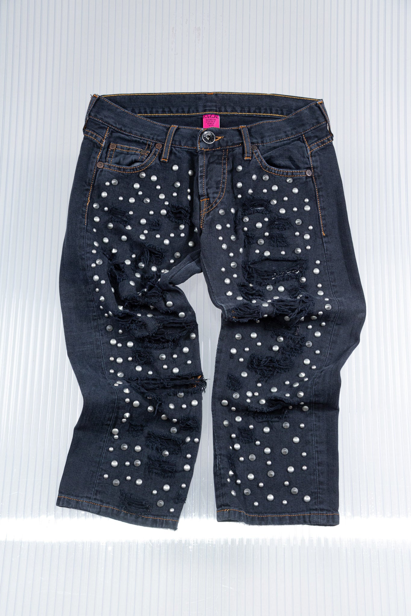 DISTRESSED SILVER STUDDED CAPRI PANTS