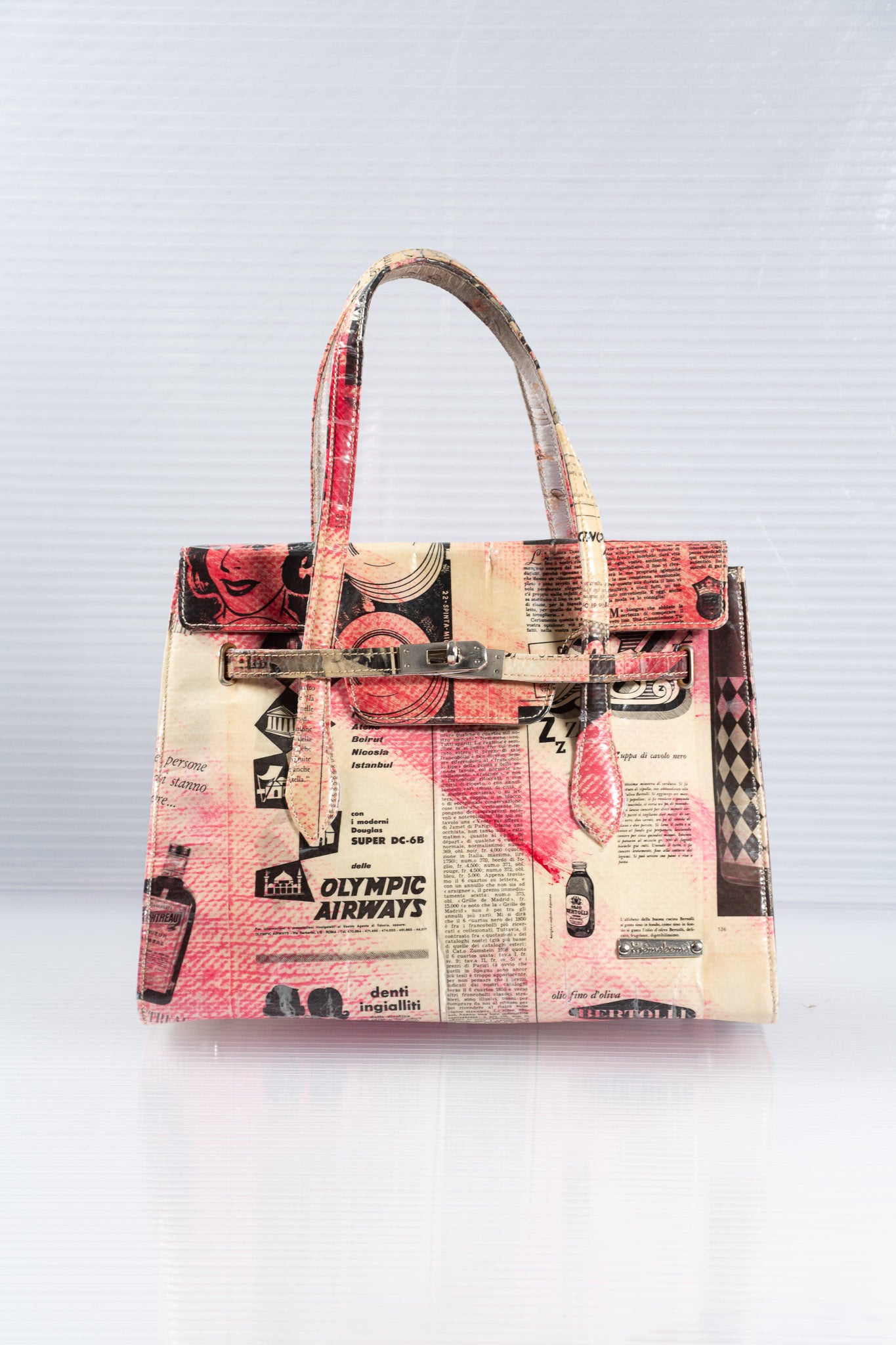 NEWSPAPER PINK FIRKIN HANDBAG