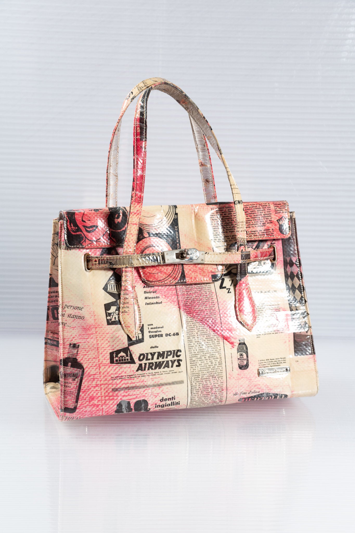 NEWSPAPER PINK FIRKIN HANDBAG