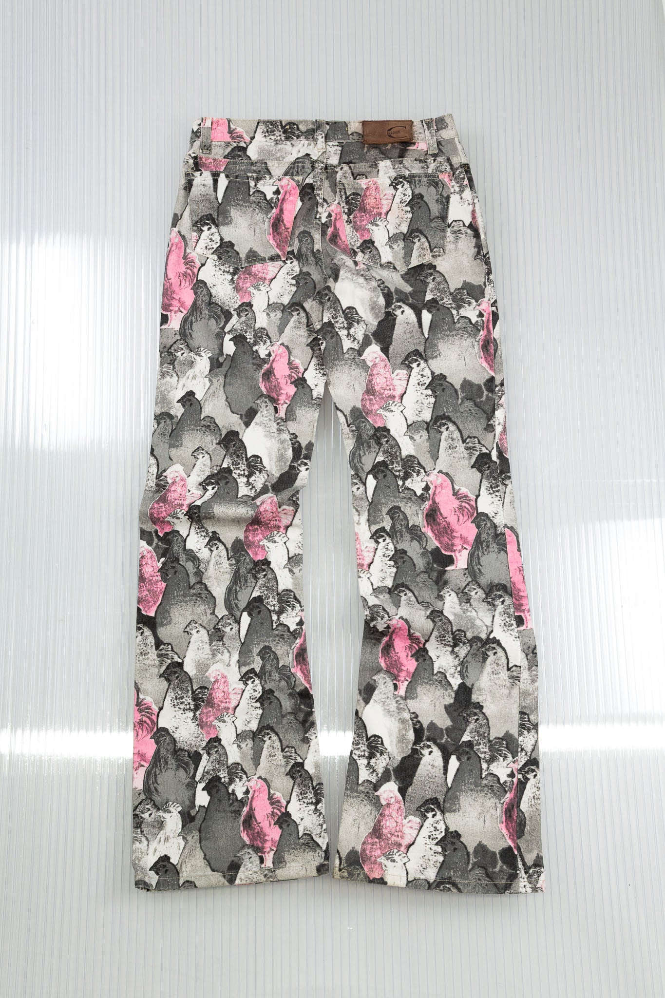 ROBERTO CAVALLI PINK & GREY ROOSTER PRINT FLARED DENIM