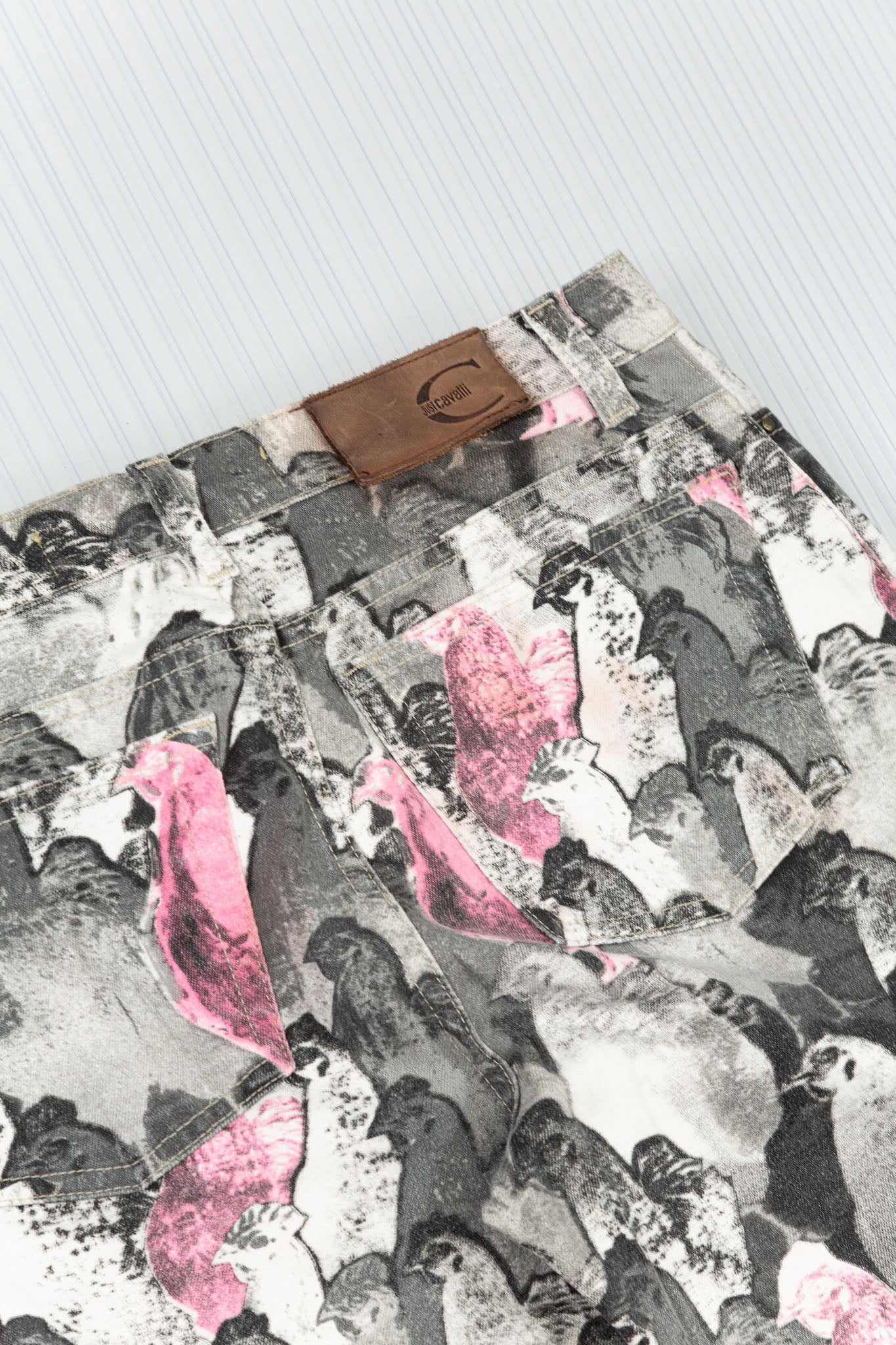 ROBERTO CAVALLI PINK & GREY ROOSTER PRINT FLARED DENIM