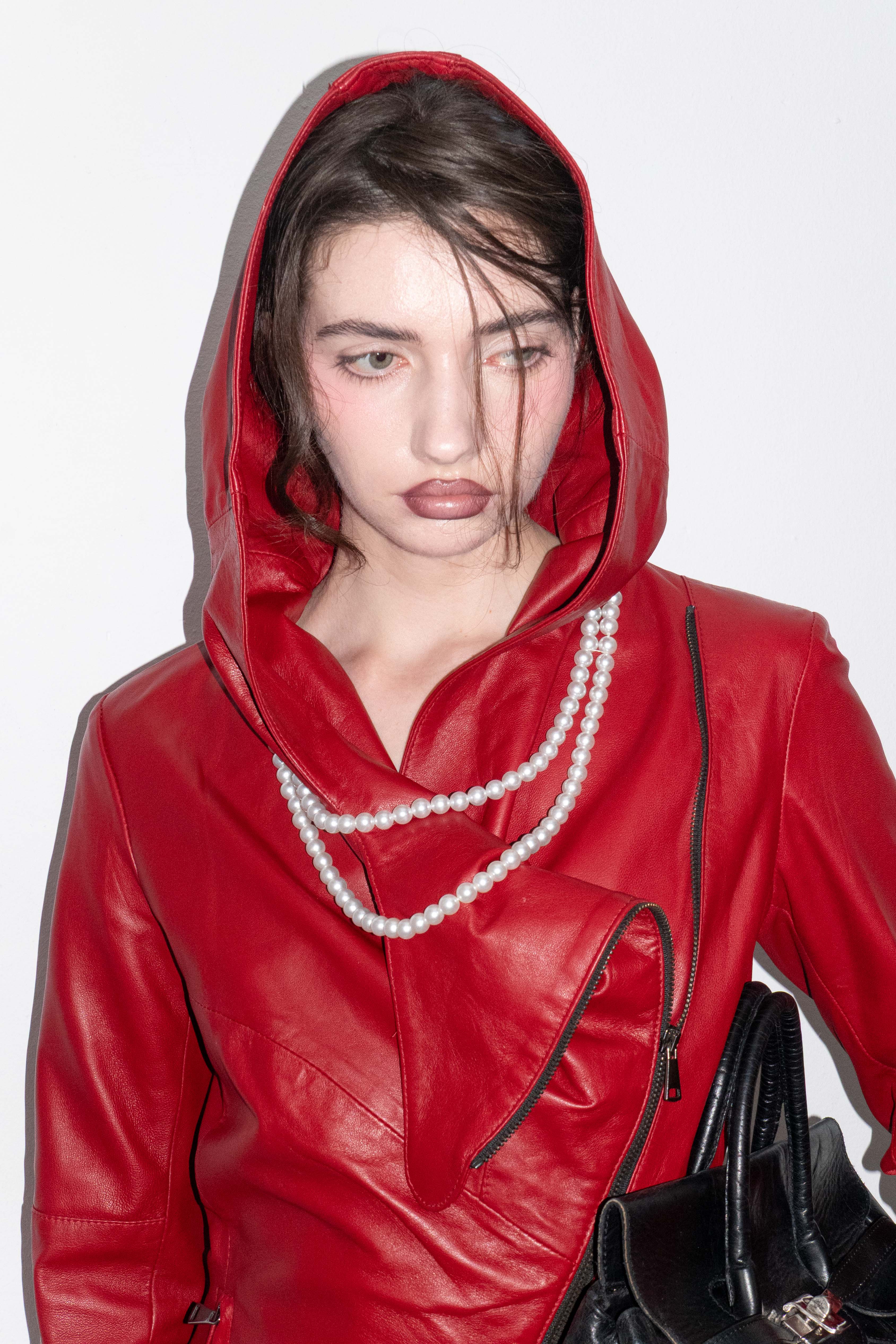 RED ASYMMETRIC DRAPED HODDED LEATHER JACKET